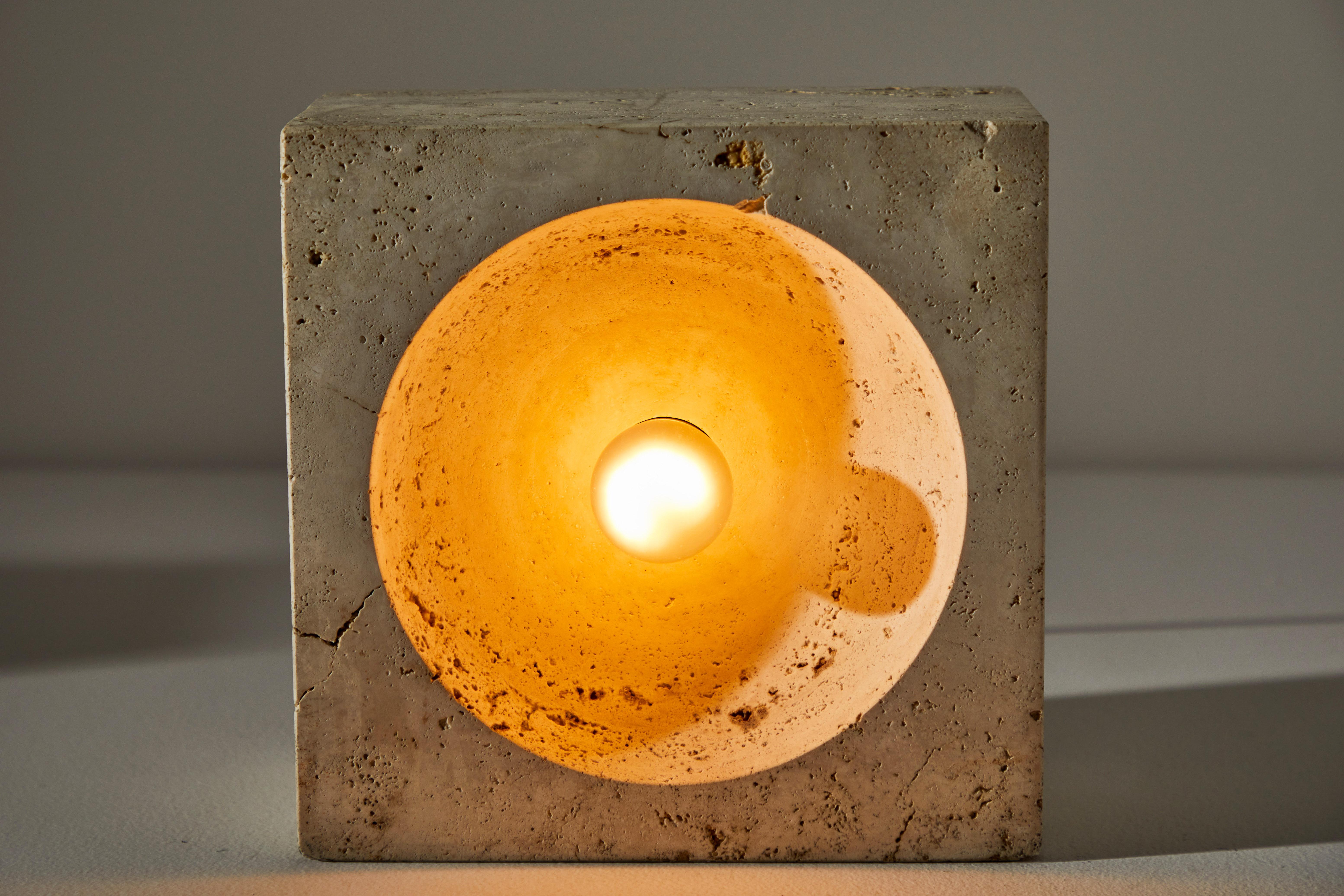 'Zero' table lamp by Nucleo Sormani. Designed and manufactured in Italy, circa 1960s. Travertine, original cord. We recommend one E27 75w maximum Edison bulb per fixture. Priced and sold individually, not as a set.