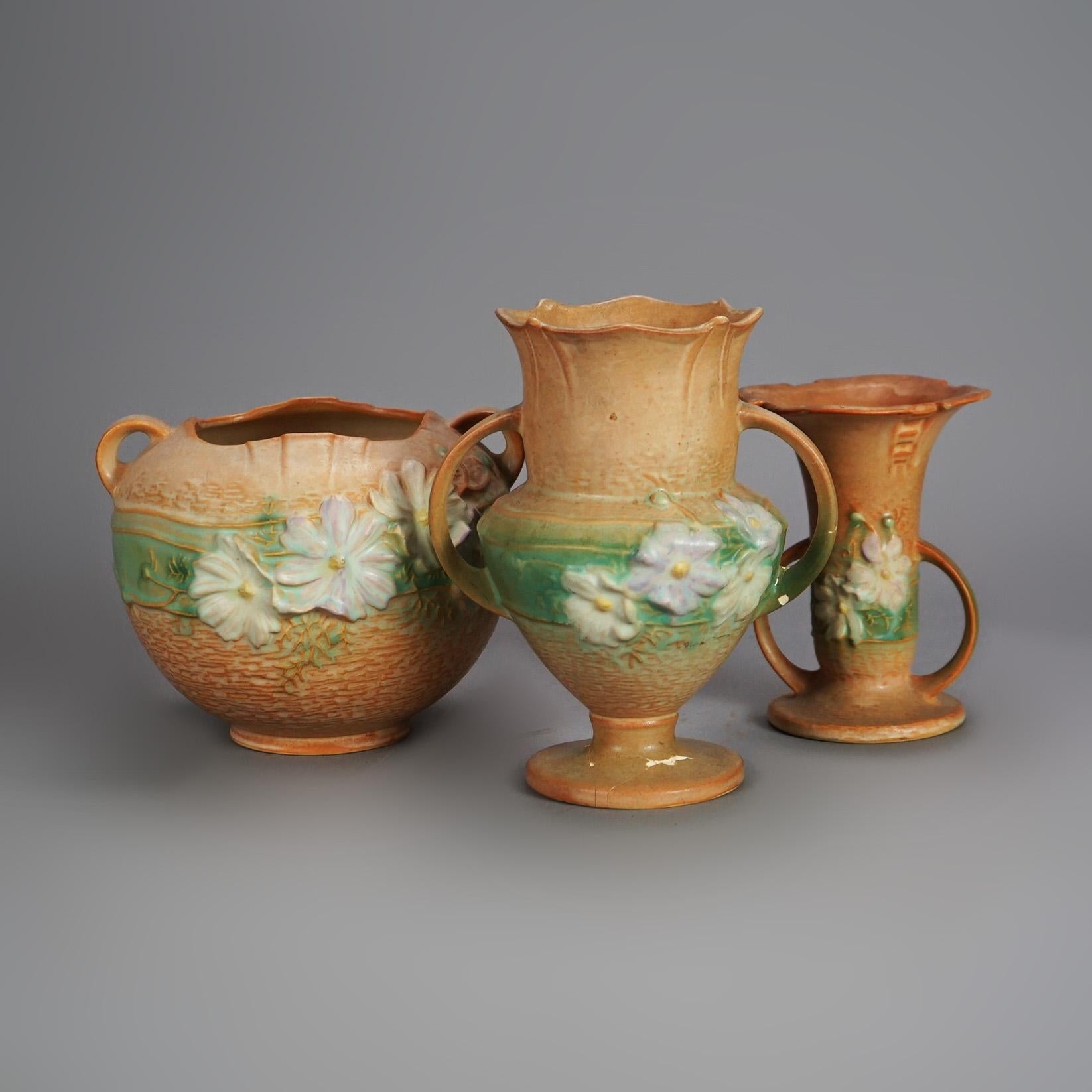 Three Tan Roseville Art Pottery with Cosmos Pattern  (with damage) Mid 20thC

Measures - 8.25