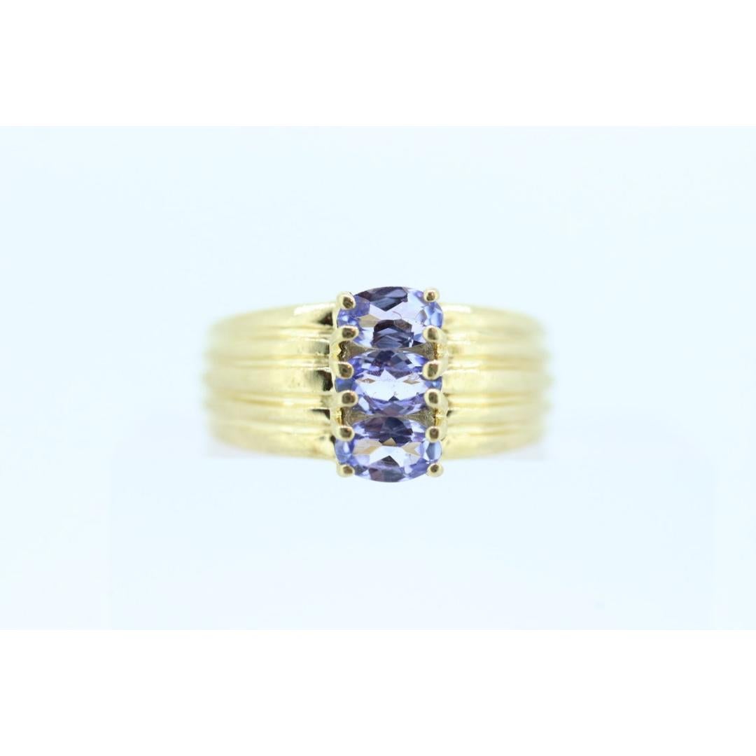 Anello con tre tanzaniti a grappolo. Anello largo ovale con tripla tanzanite 14k. Tanzanite in vendita 5
