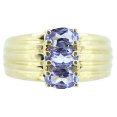 Three Tanzanite cluster ring. 14k Triple Tanzanite oval wide ring. Tanzanite