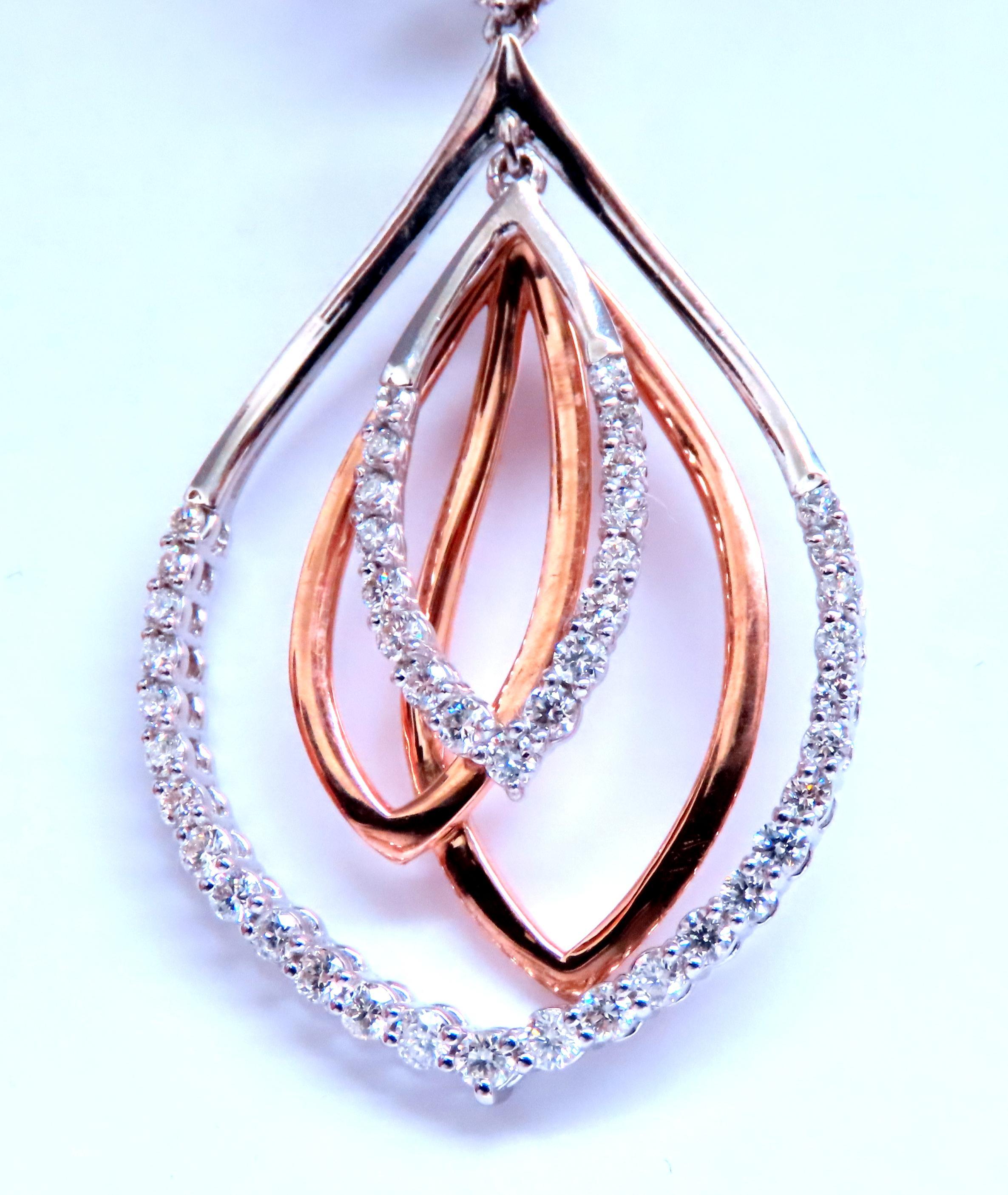 Three Tier Dangling Loops Diamond Earrings.
2.10ct Round Natural Diamonds.
G-color
Vs-2 clarity
14kt rose & white gold.
15.8 grams
55mm long
25mm wide
Lever Closure 

$9000 appraisal to accompany