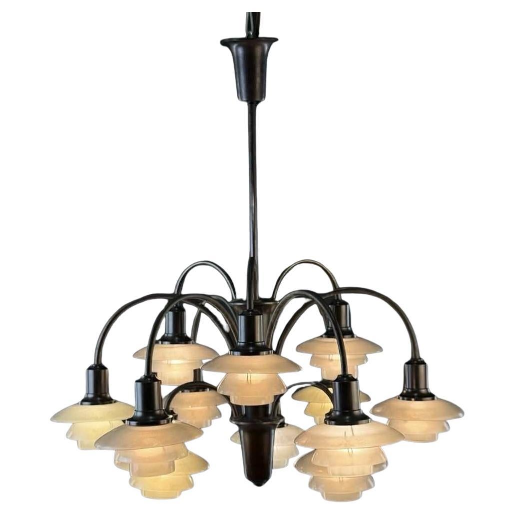 Three-Tier Bombardment Chandelier, circa 1933 en venta