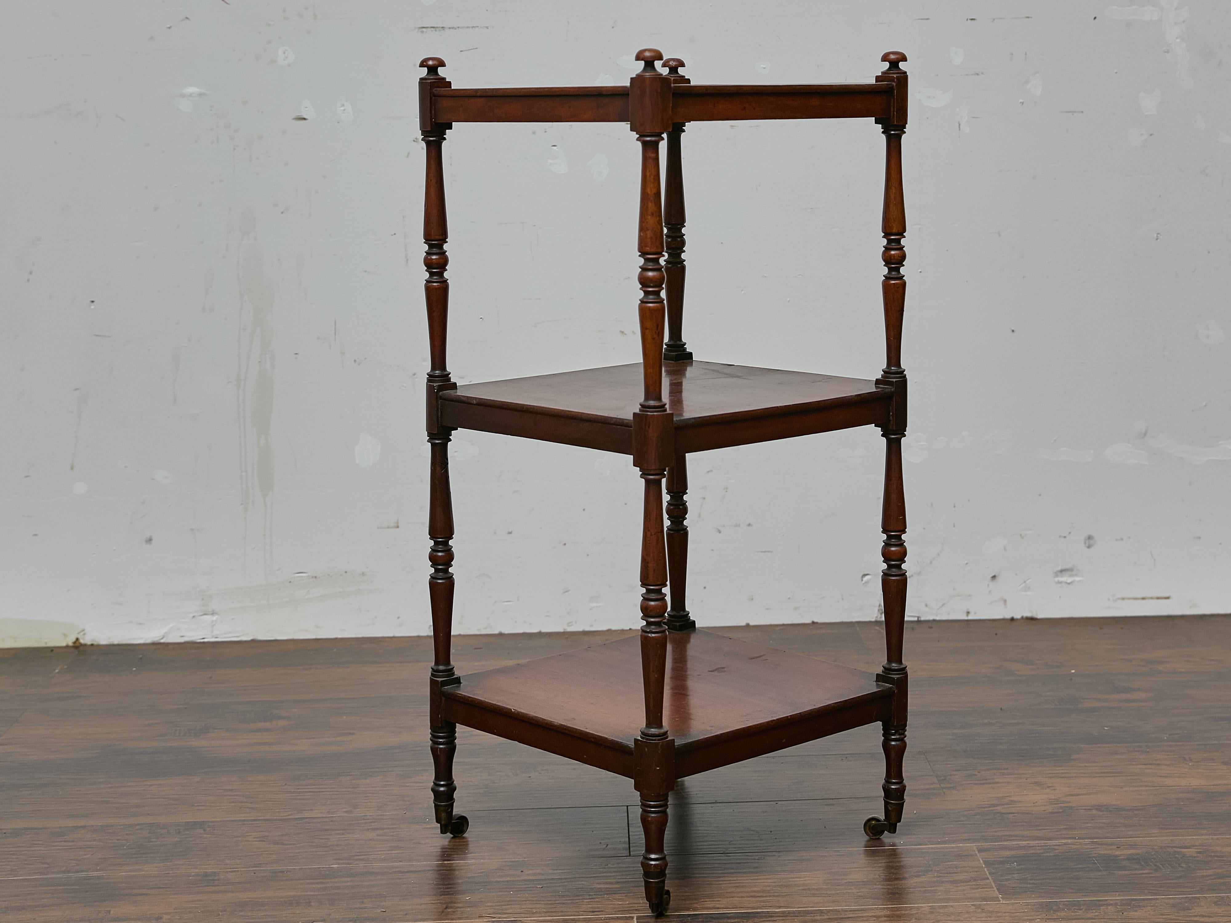 Three-Tier English Mahogany Étagère with Turned Supports and Casters For Sale 1