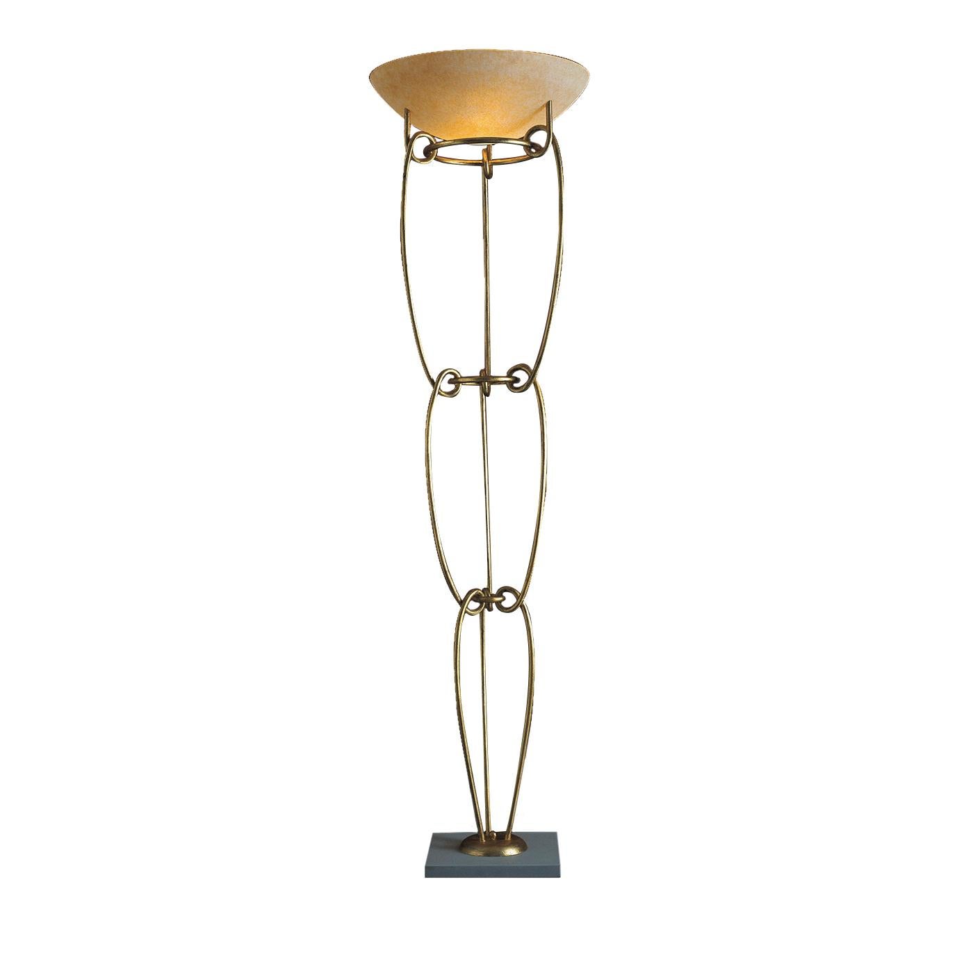 Entirely handcrafted of forged iron, this exquisite floor lamp features a timeless, three-tiered, sinuous design that makes it ideal for any decor. The combination of the modernity of the iron with the magnificent half-sphere lampshade made of