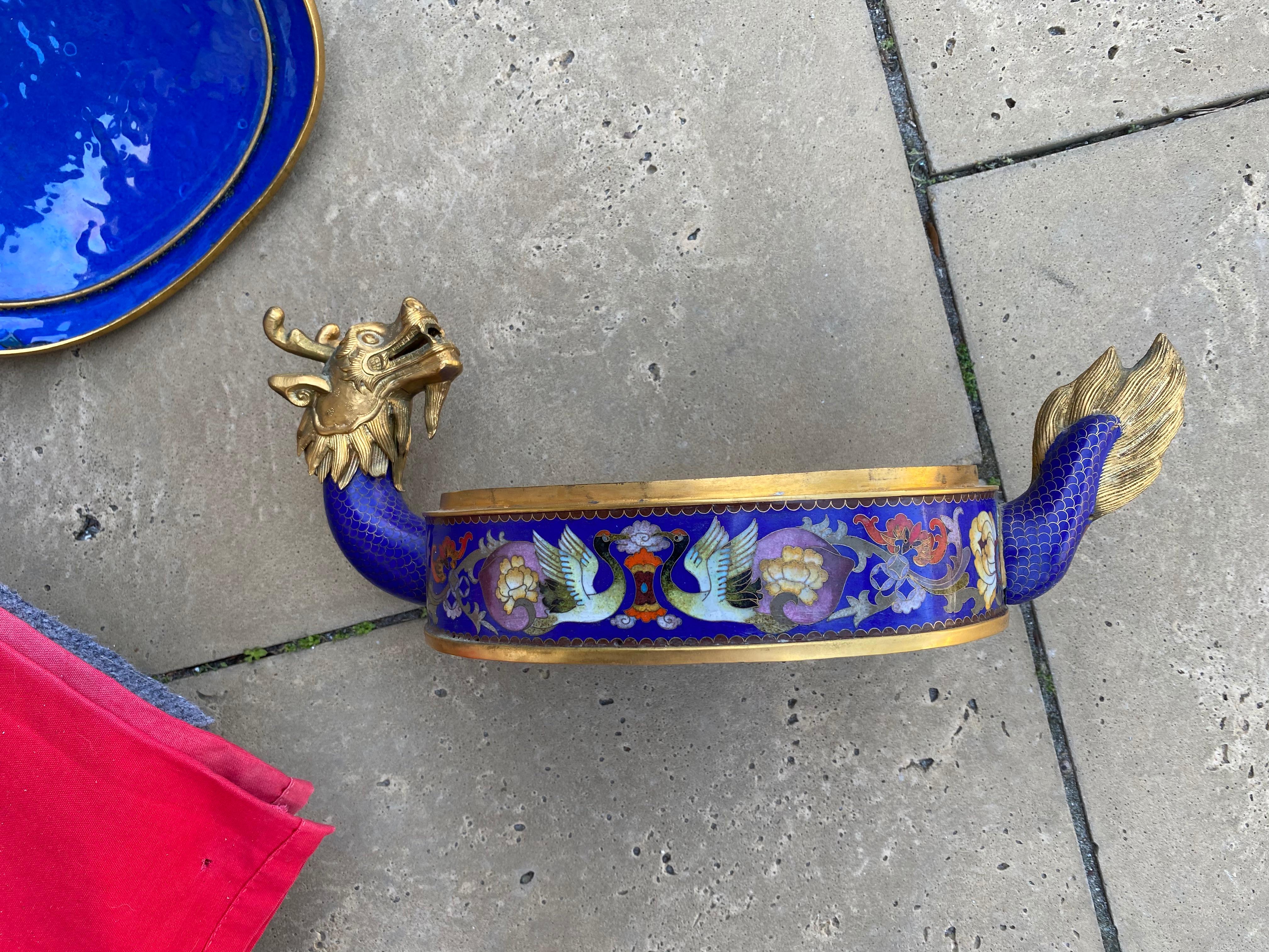 This Chinese Censer
is in the design of a Turtle/Dragon which is legendary creature that combines two of the four celestial animals of Chinese mythology the body of a turtle and head of a dragon is promoted as a positive ornament in Feng Shui