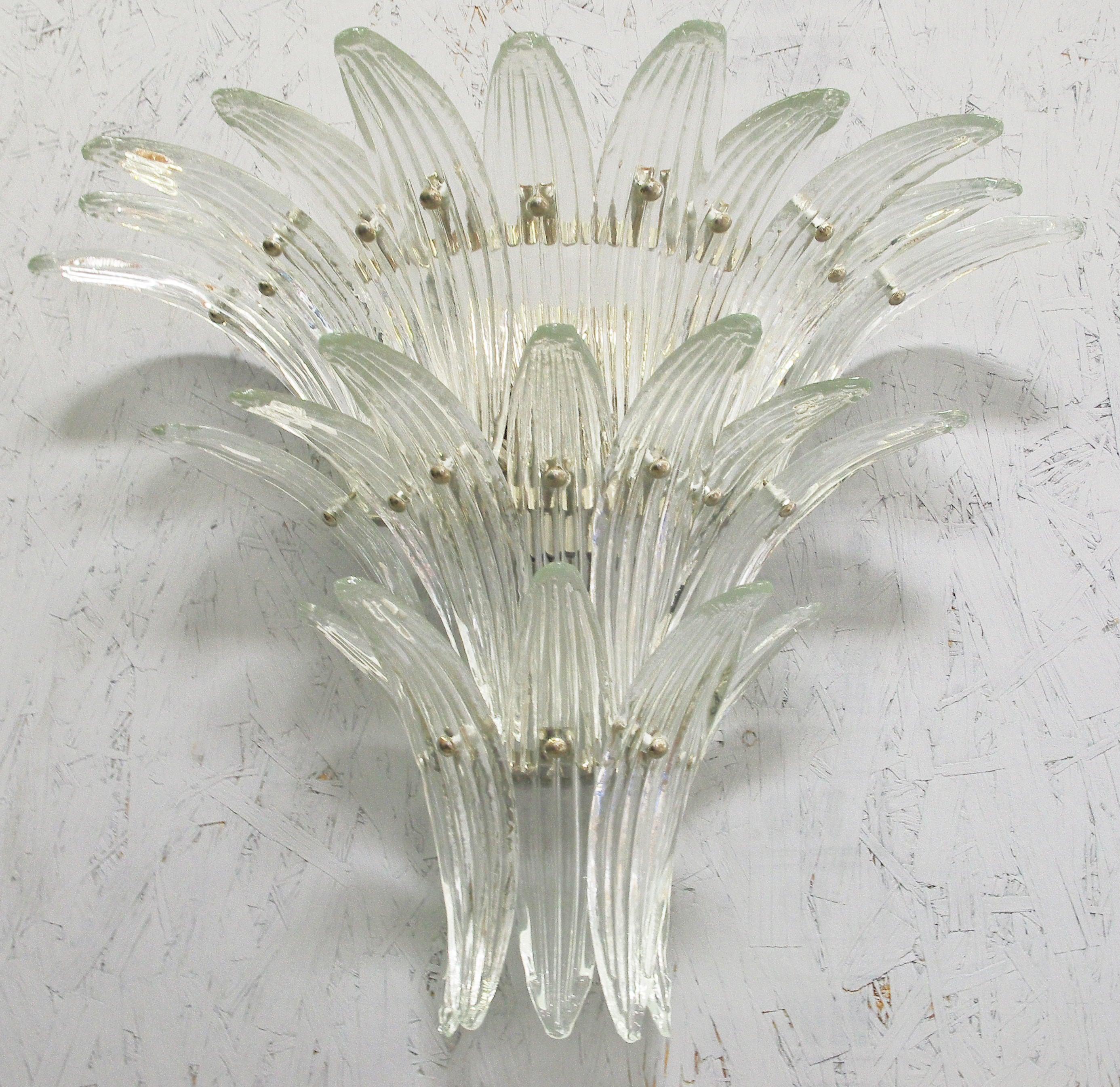 Italian Palmette wall light with 23 clear Murano glass leaves, mounted on chrome finish metal frame by Fabio Ltd / Made in Italy
3 lights / E12 or E14 type / max 40W each
Measures: Width 27 inches, height 20 inches, depth 10 inches
Order Only / This