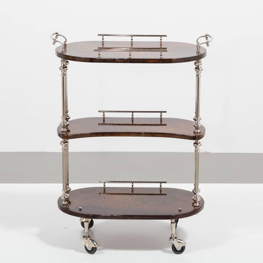 A rare three-tiered brown goatskin lacquered bar cart with nickel plated handles and castors by Aldo Tura, Italy, 1950s
Particularly neat in size this is a fantastic example of Aldo Tura's work, the first of this model we have had the pleasure of