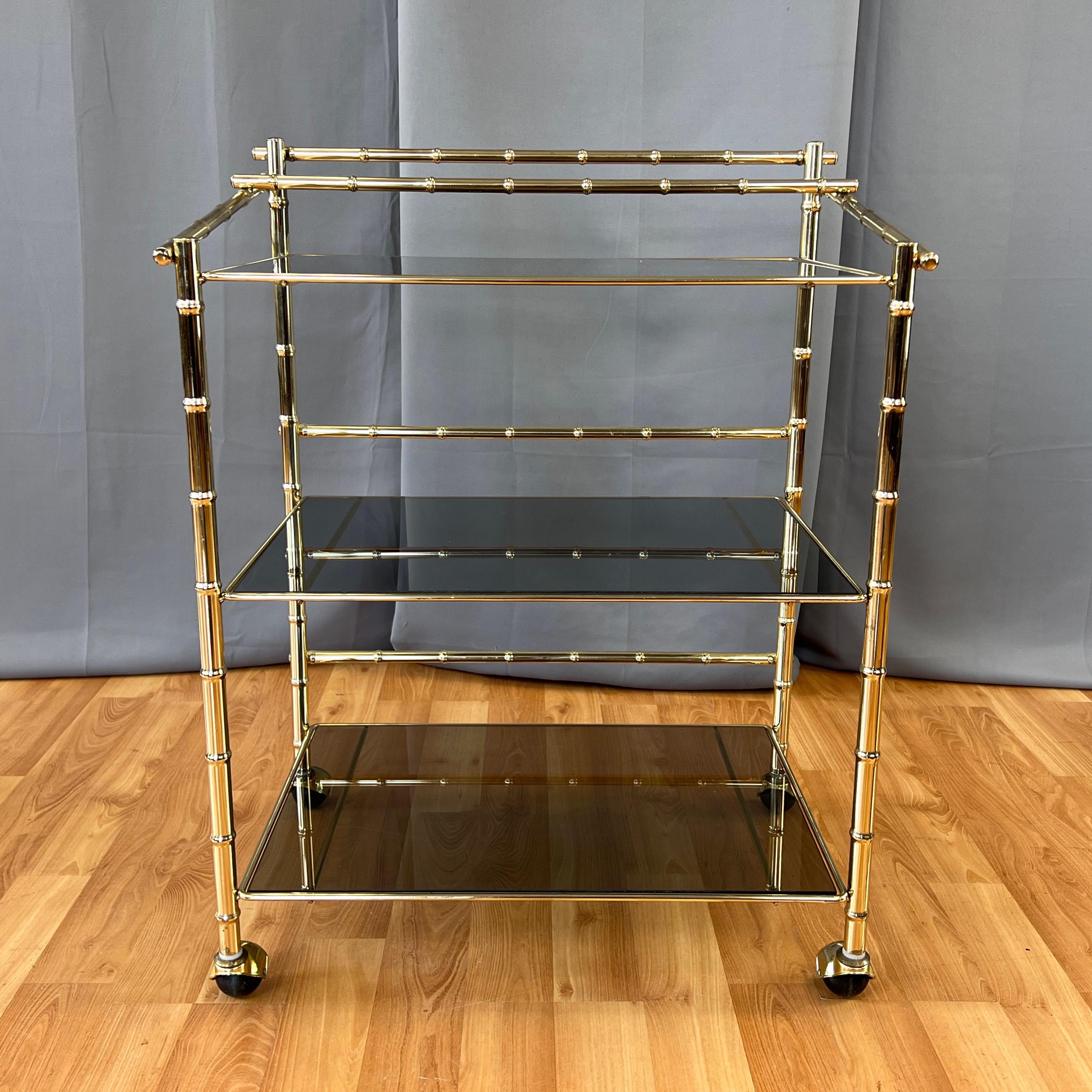 Three-Tiered Brass Faux Bamboo and Smoked Glass Bar Cart, 1970s In Good Condition For Sale In San Francisco, CA