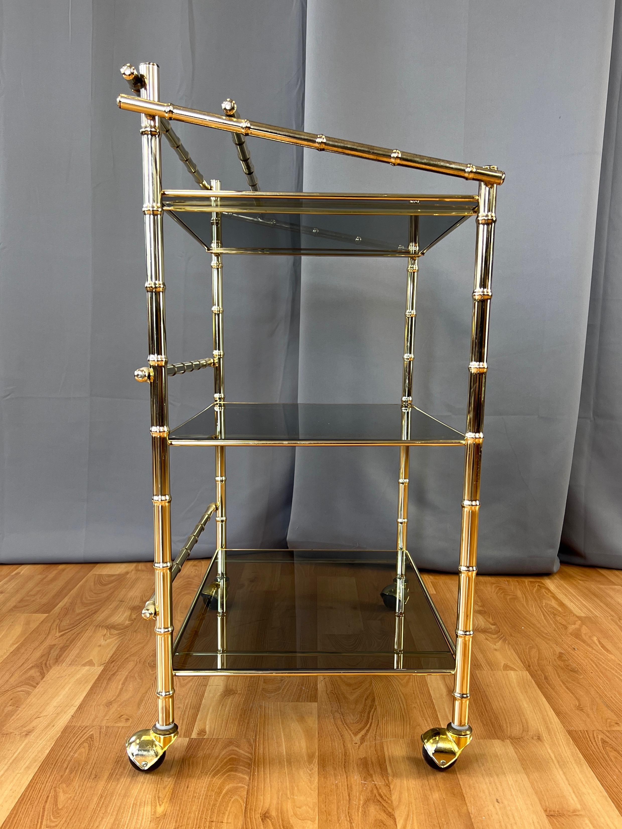 Late 20th Century Three-Tiered Brass Faux Bamboo and Smoked Glass Bar Cart, 1970s For Sale