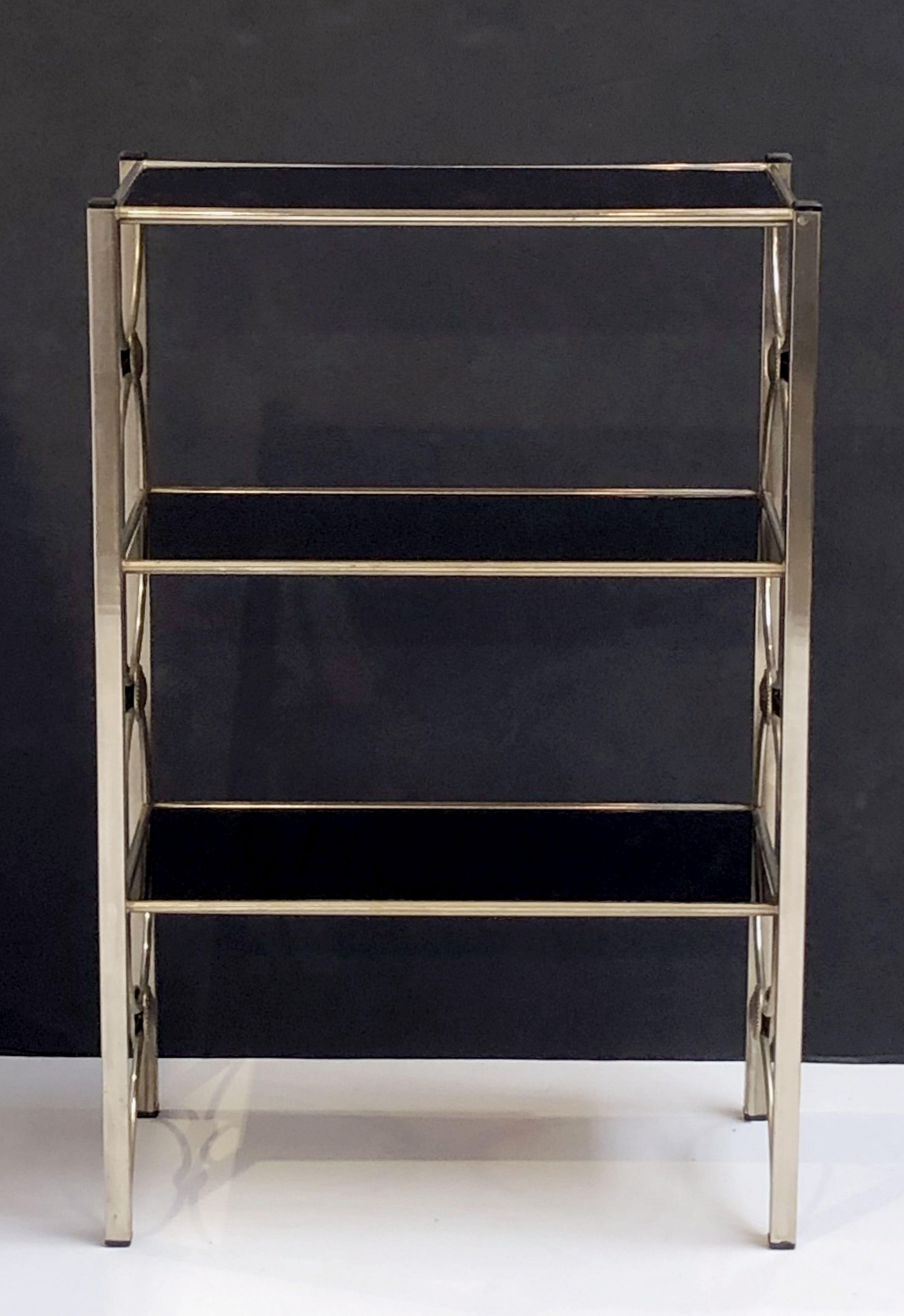 English Three-Tiered Shelves or Étagère of Metal and Black Glass