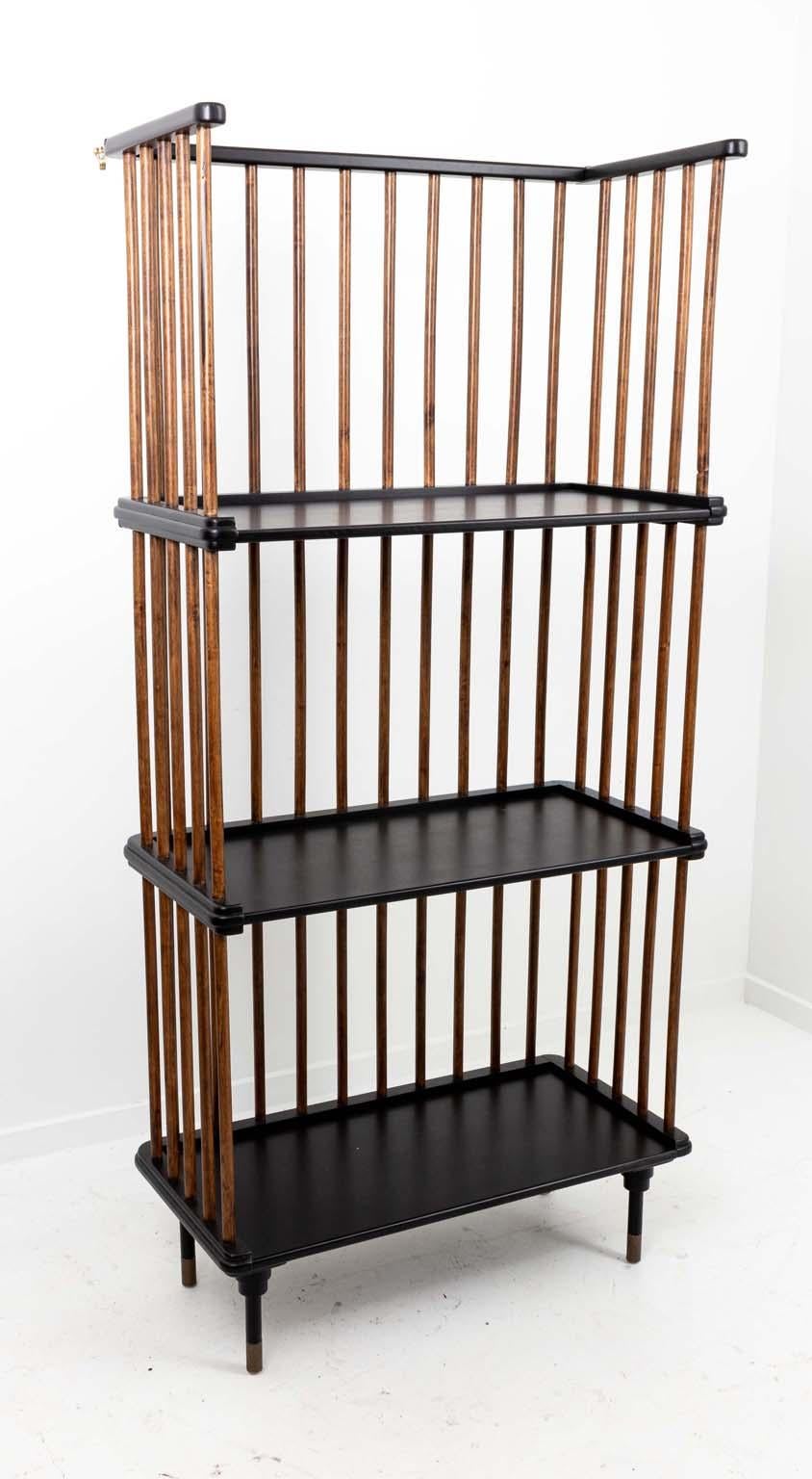 A three shelved Windsor style etagere with a two toned spindled back and shelf. Please note wear consistent with age. 
