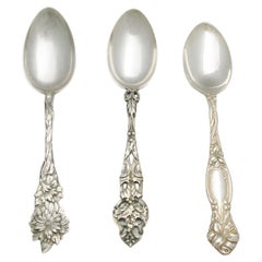 Three Tiffany and Co Sterling Silver Teaspoons with Assorted Decorations
