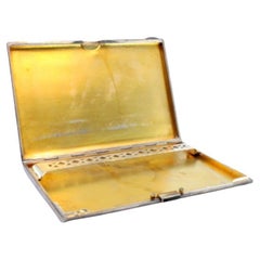 Three-tone silver-gold case with gold interior and cut-out holder