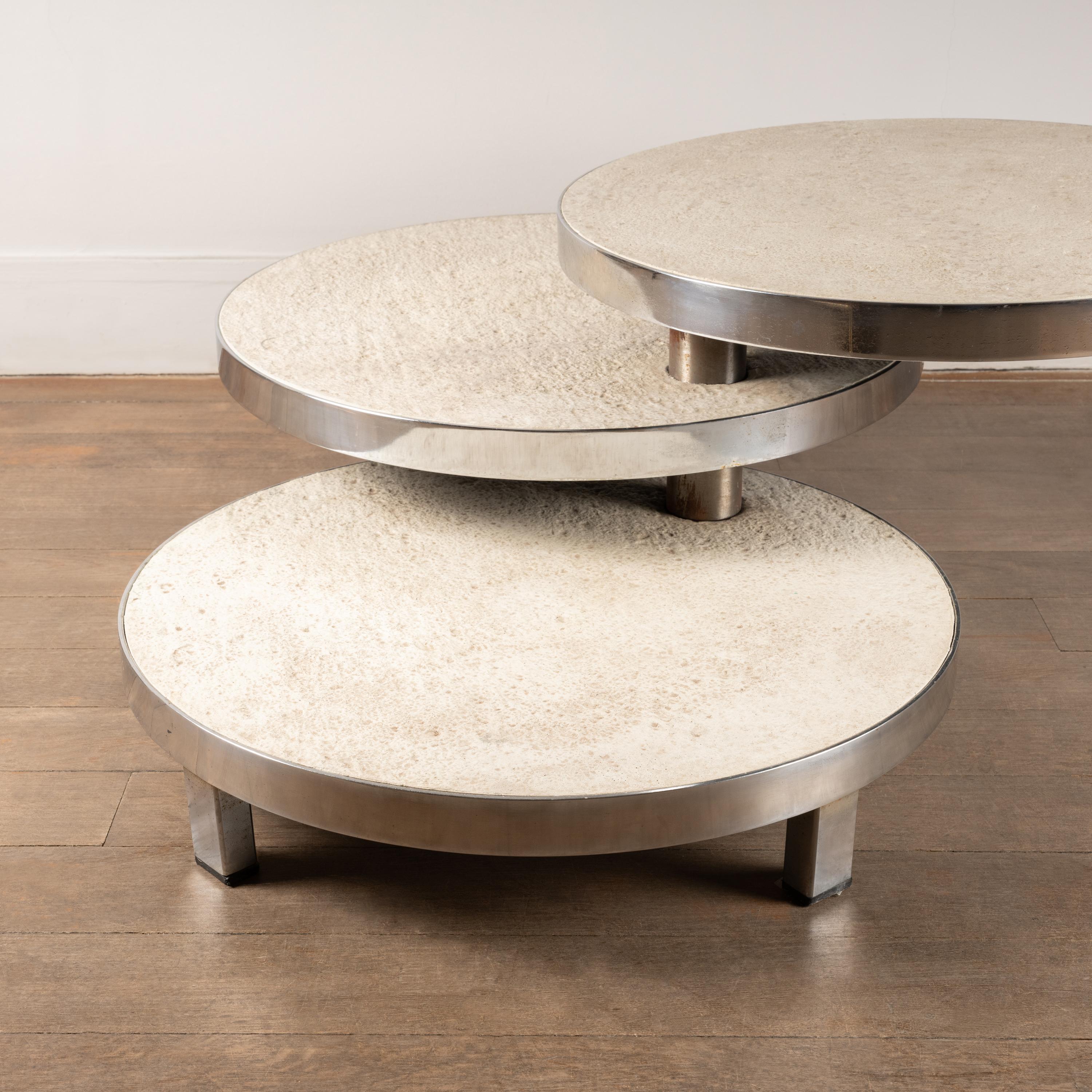 Side table, Maria Pergay design for Mercier Frères circa 1968.
Three 180 degree swivel trays. 
Structure in chromed steel and wooden trays in imitation stone resin.
France, circa 1960.

Dimensions: 

Height 35 cm / 13,77 inch 
Diameter 60 cm