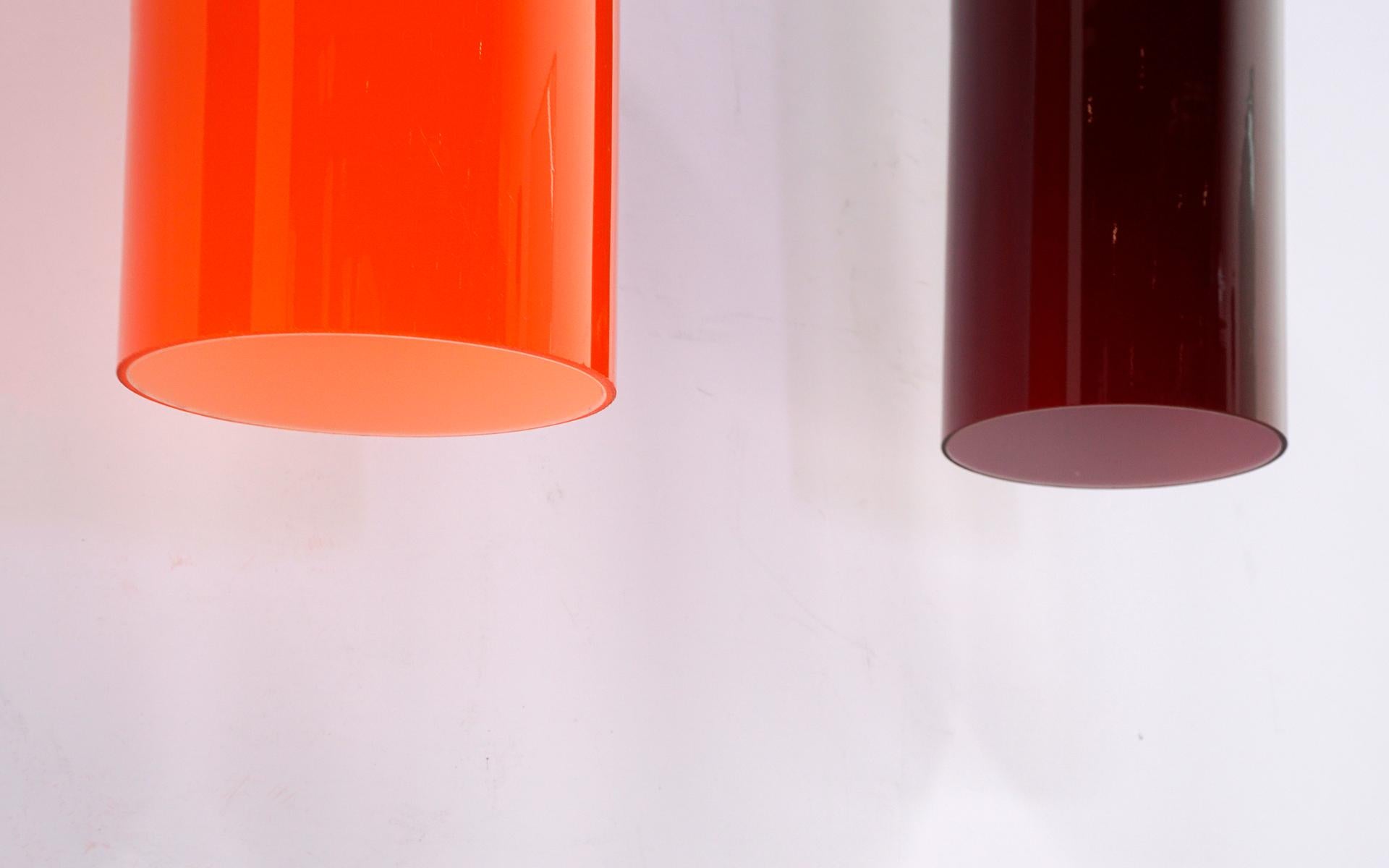 Mid-Century Modern Three Tubular Glass Pendant Lights, Two Deep Red, One Orange, 1960s For Sale