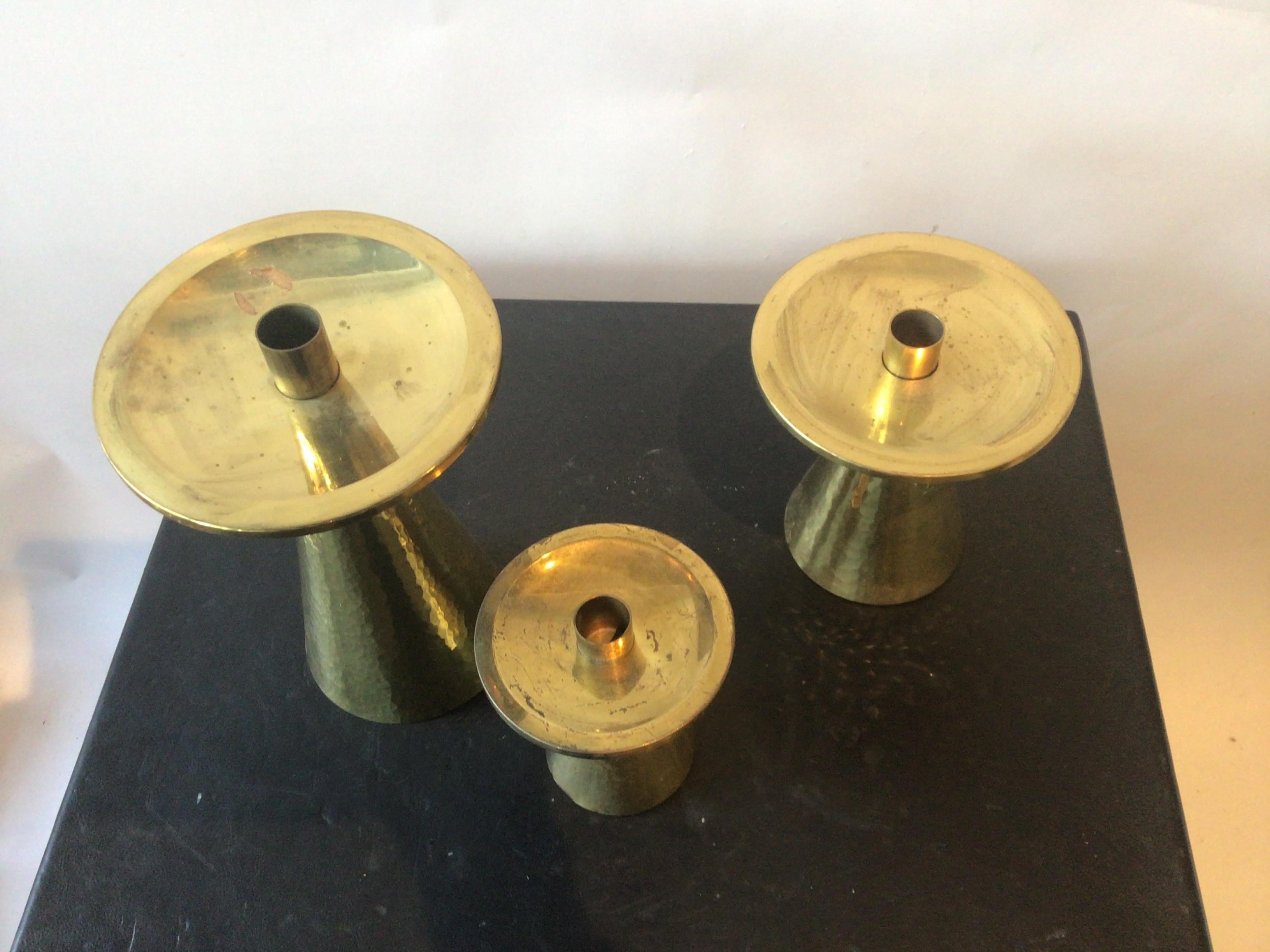 Three Varied Height 1960s Swiss Brass Candlesticks In Good Condition For Sale In Tarrytown, NY