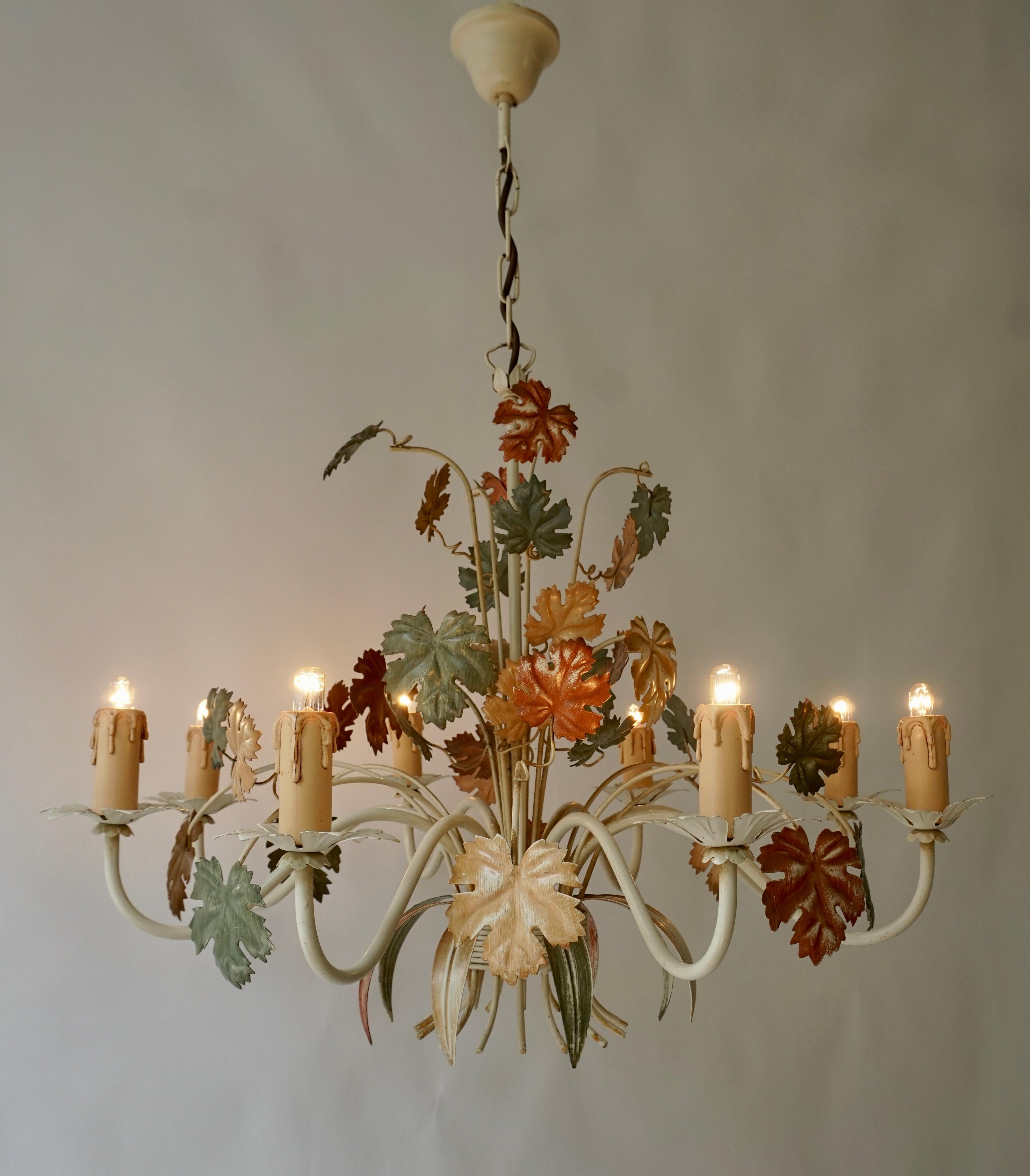 Three Hollywood Regency tole floral chandelier with leaves . Original ceiling cap. Made in Italy. Eight and five arms. 

We have two small and one large chandelier available.
The dimensions of the two small are:diameter 19.6
