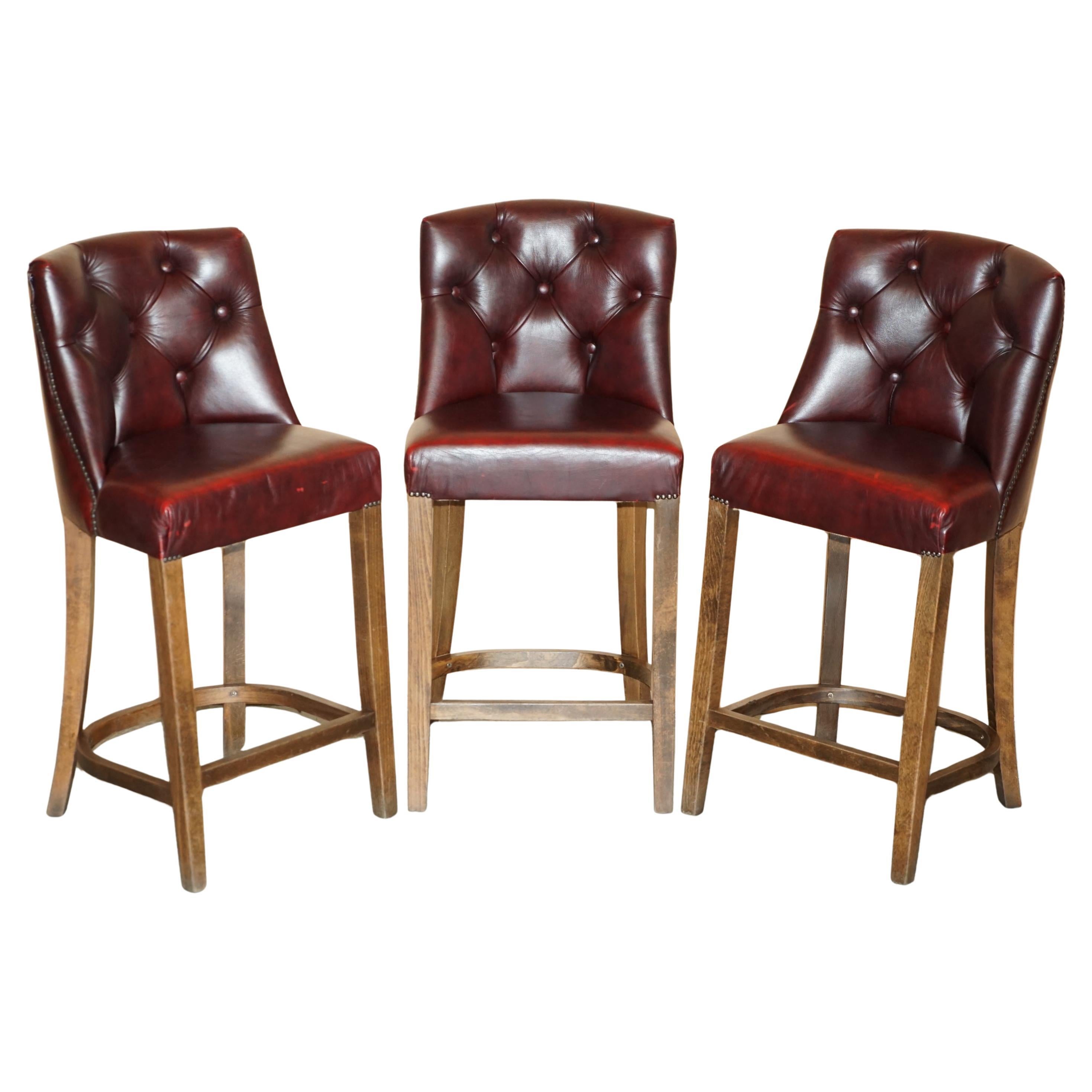 THREE VINTAGE OXBLOOD LEATHER CHESTERFIELD TUFTED KITCHEN DINER BAR STOOLs