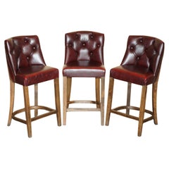 THREE VINTAGE OXBLOOD LEATHER CHESTERFIELD TUFTED KITCHEN DINER BAR STOOLs