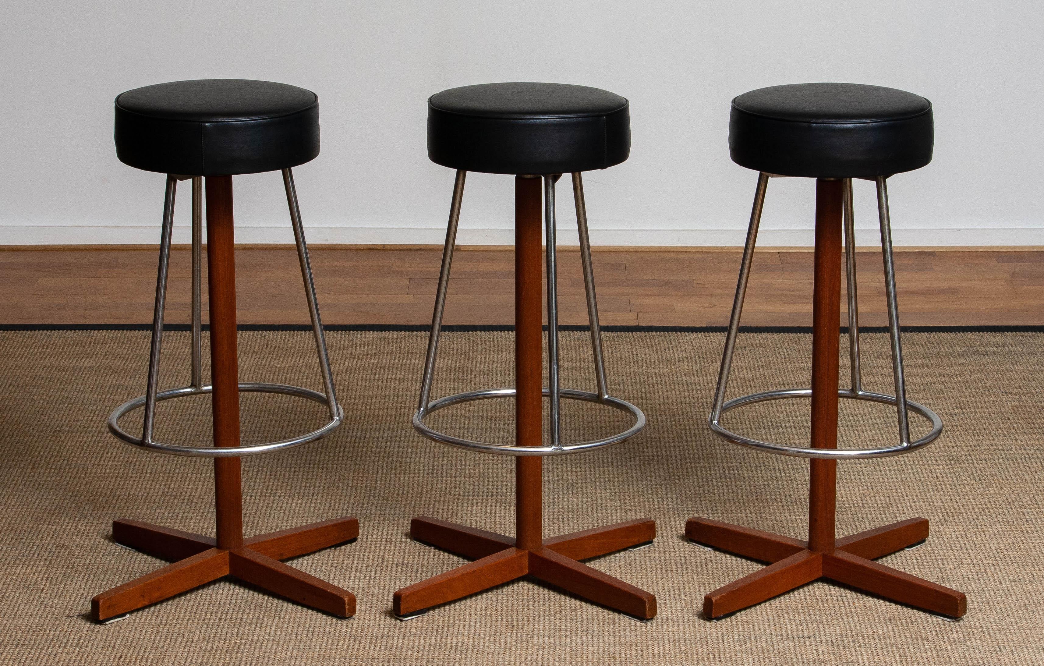 Scandinavian Modern Three Vintage Teak and Chrome Swivel Bar Stools By Johanson Design from Sweden For Sale