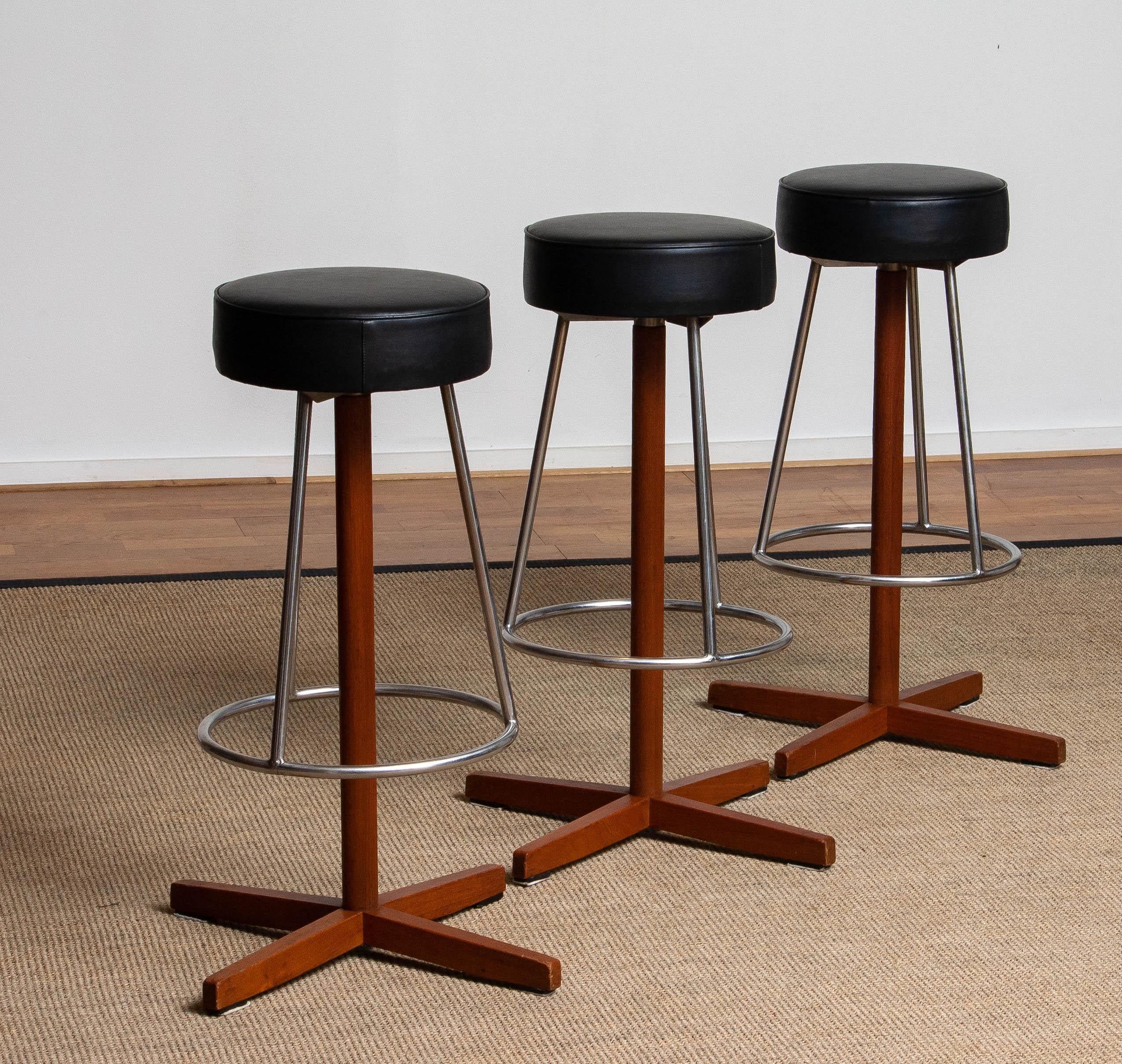 Mid-20th Century Three Vintage Teak and Chrome Swivel Bar Stools By Johanson Design from Sweden For Sale