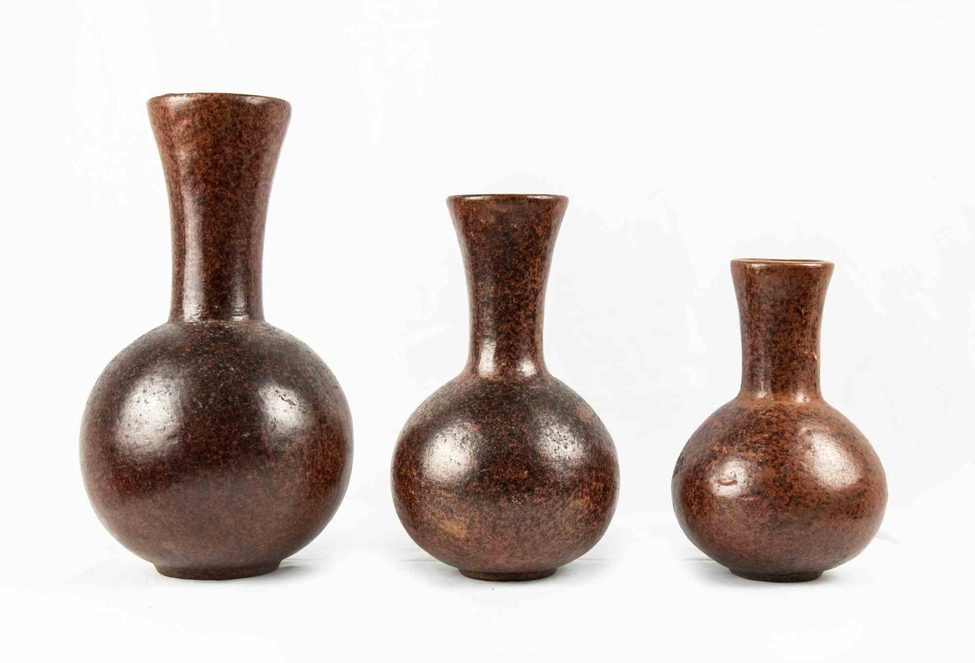 These three vintage vases were realized in the 1970s.

Original stone with marbled decorated Surface.

Made in Italy.

Various Dimensions: 30 x 16 cm; 24 x 14 cm; 20 x 12 cm.

Perfect conditions.