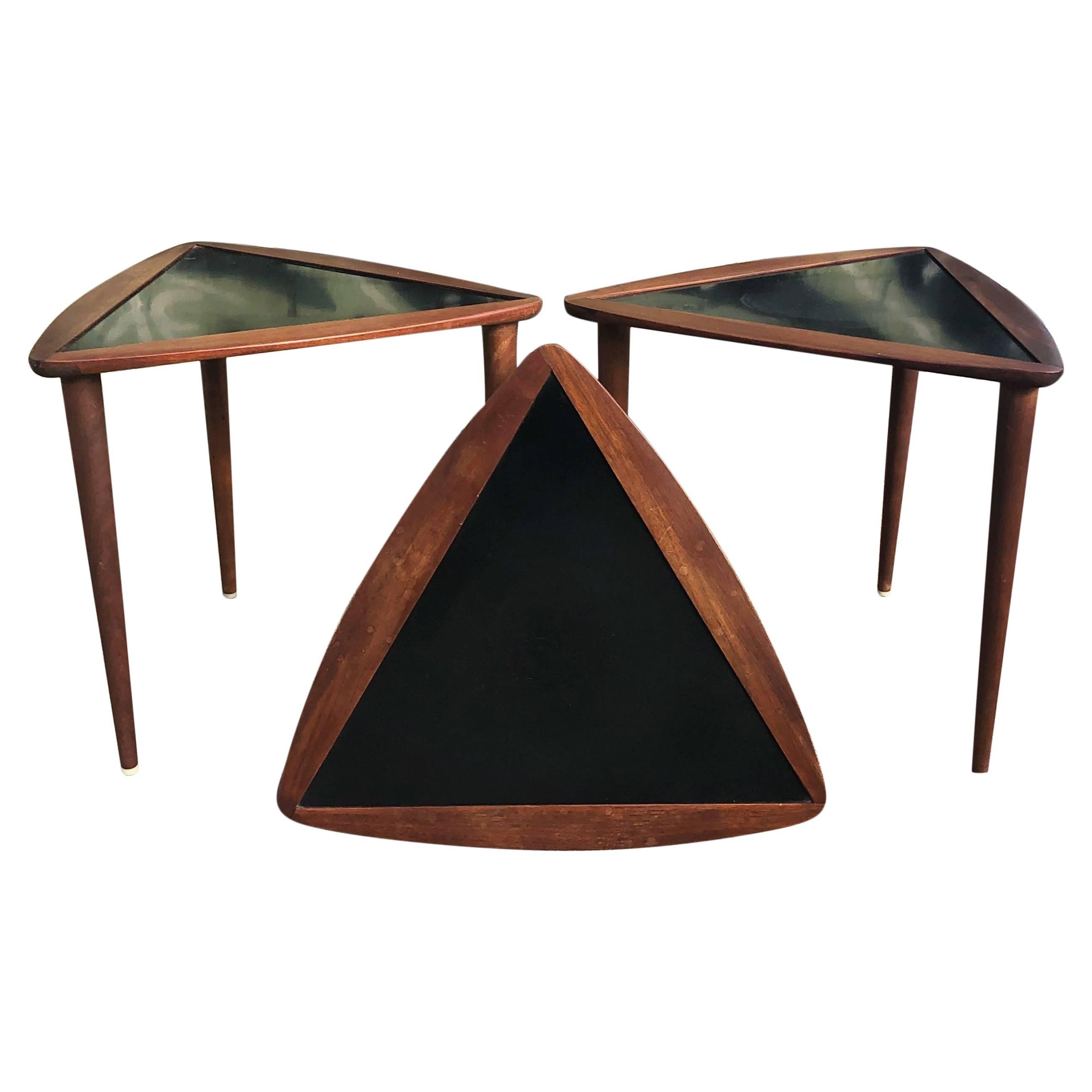 Three walnut nesting tables by Arthur Umanoff. Wood has been oiled. In excellent condition.