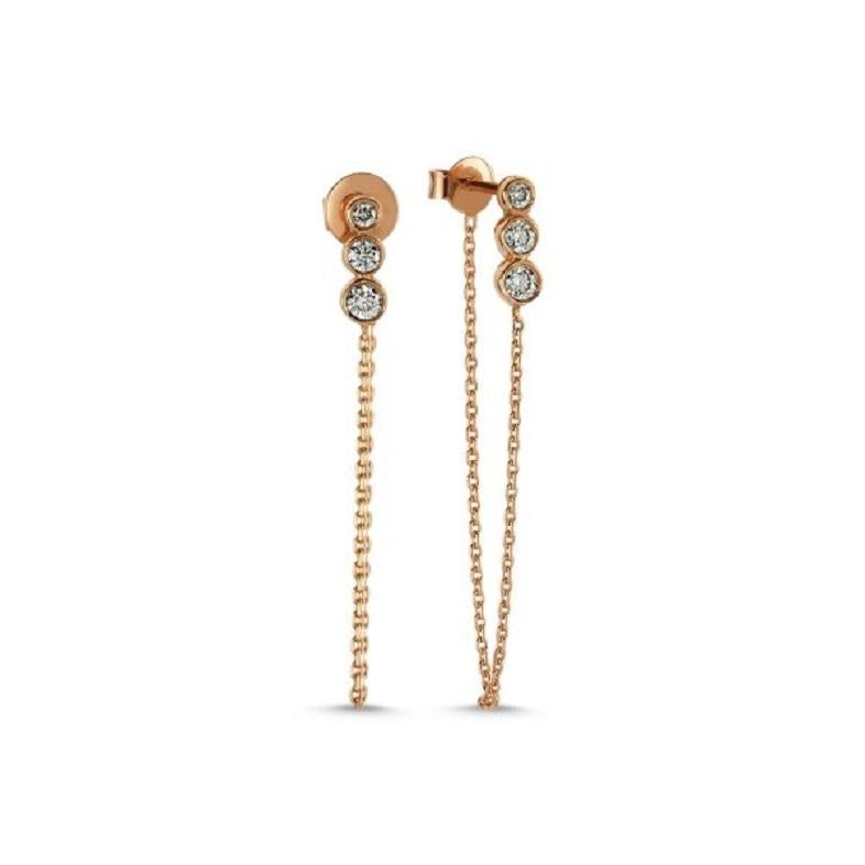 Three white diamond chain earring (single) with 14k rose gold by Selda Jewellery

Additional Information:-
Collection: Thunder Collection
14k Rose gold
0.14ct White diamond
Length 3.5cm