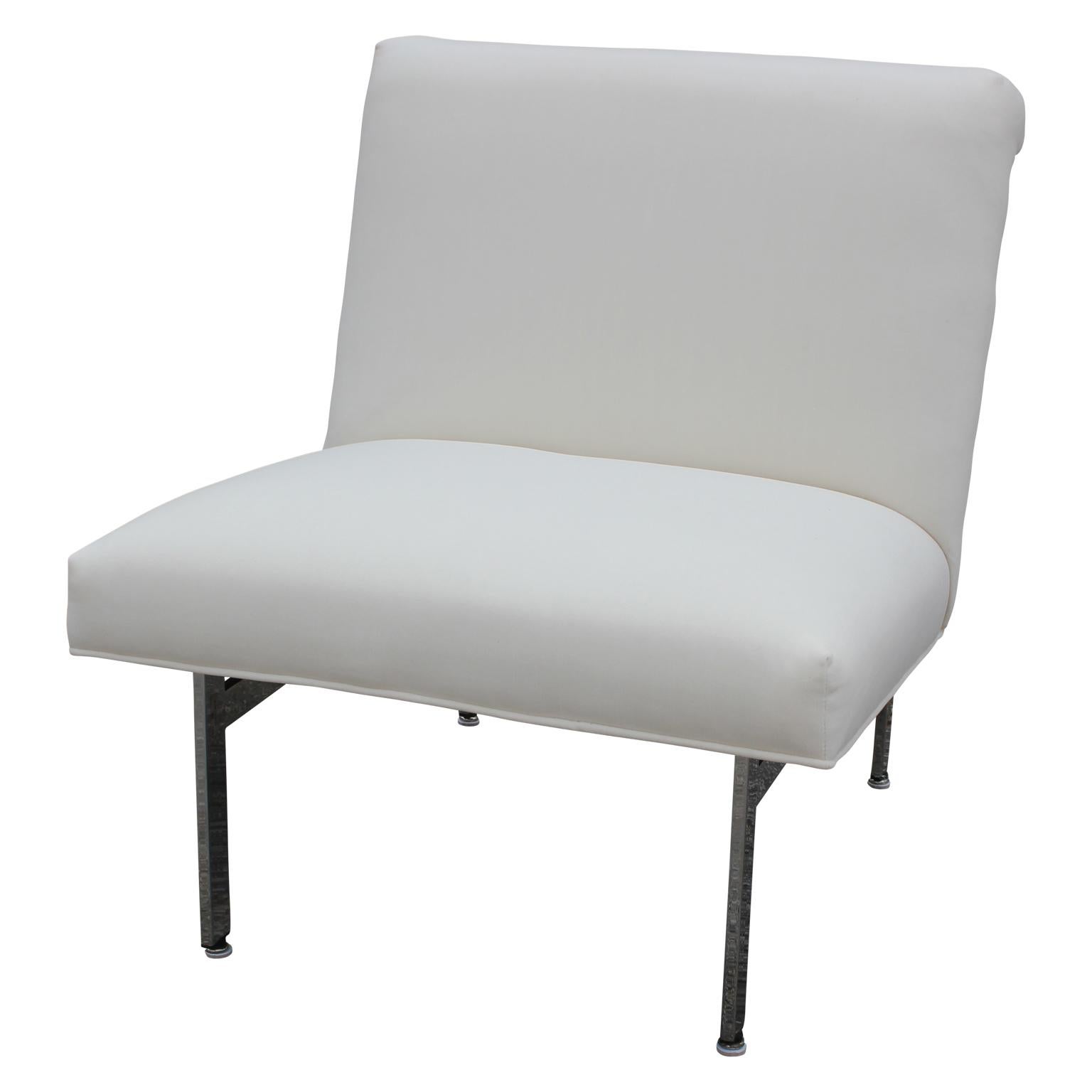 Set of velvet white chairs designed by Florence Knoll. The chairs line up perfectly to form a three-seat couch. The velvet has a soft, smooth touch making it comfortable to sit on. The chrome legs offer a clean look to the white velvet.