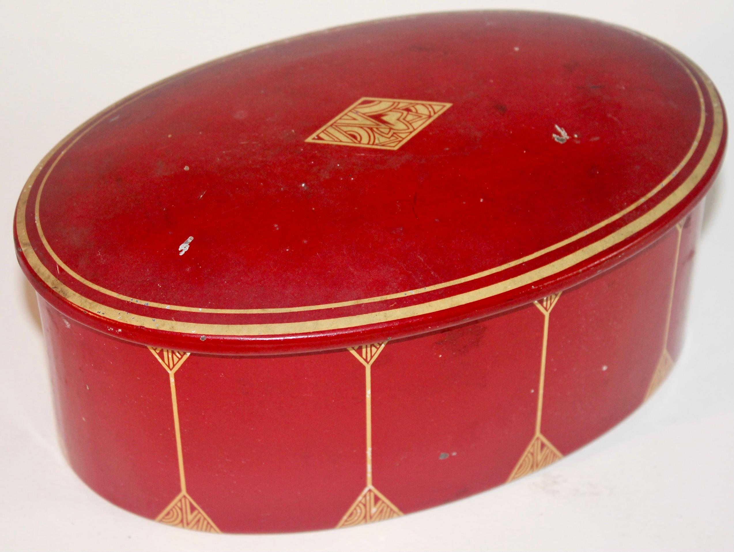 Three beautifully decorated Austrian/German biscuit or candy tins. The red oval: 8x3.5x5