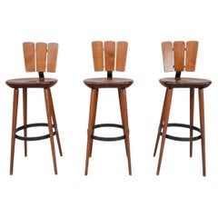Three Wood and Iron Mid-Century Bar Stools 
3
