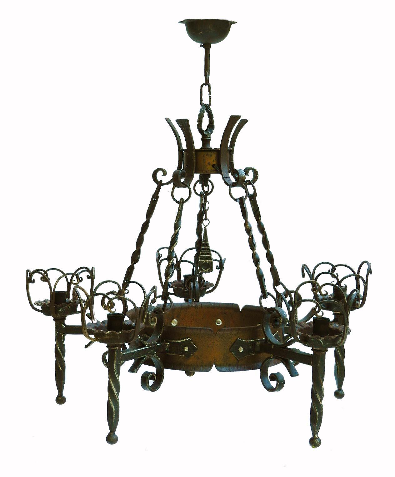 Three Franco Spanish Basque chandeliers wrought iron and copper
graduated trio all removed from the long entrance hall of a large French house
artisan made unusual and unique
The chain can be lengthened on each to increase the drop if