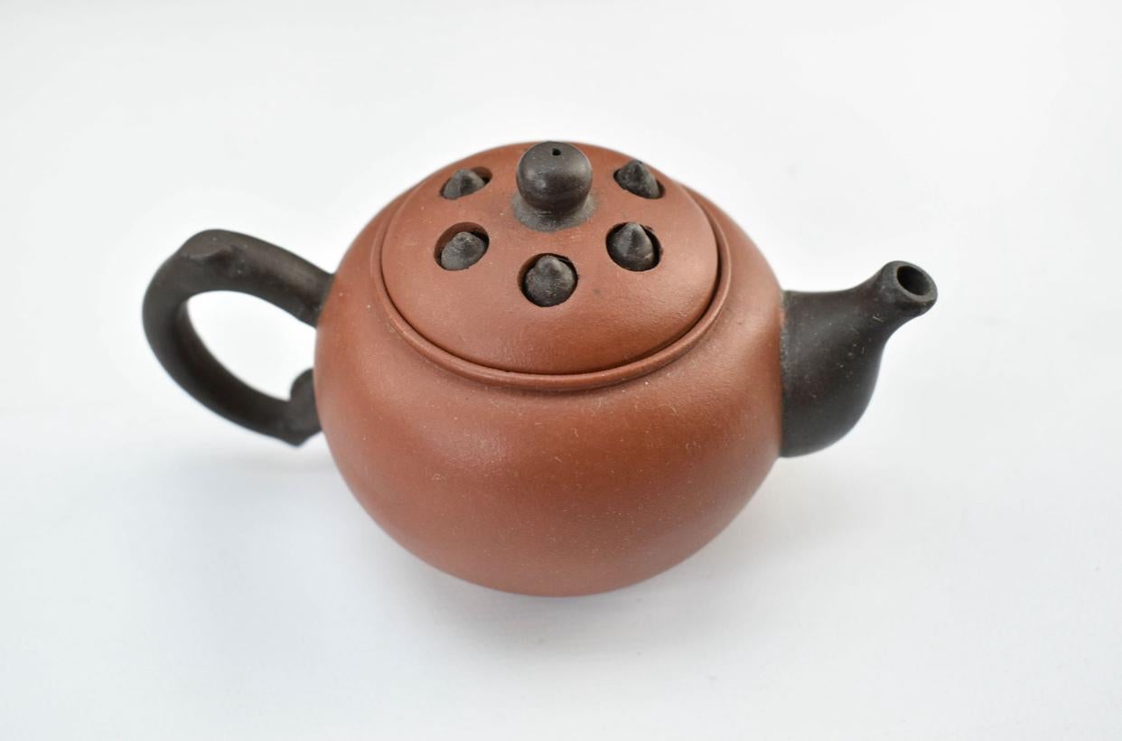 Chinese Three yixing teapots in a velvet lined box. Each teapot is a different color. For Sale