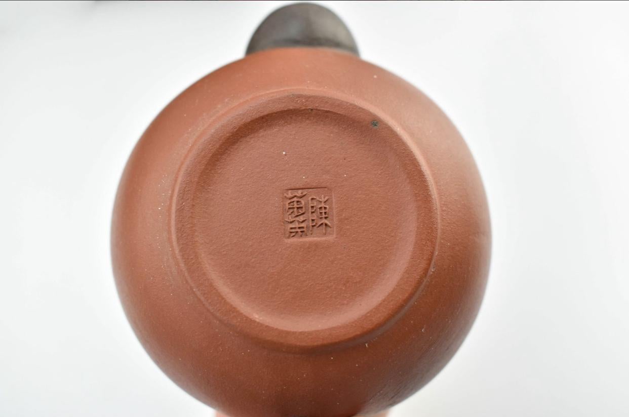 Mid-20th Century Three yixing teapots in a velvet lined box. Each teapot is a different color. For Sale