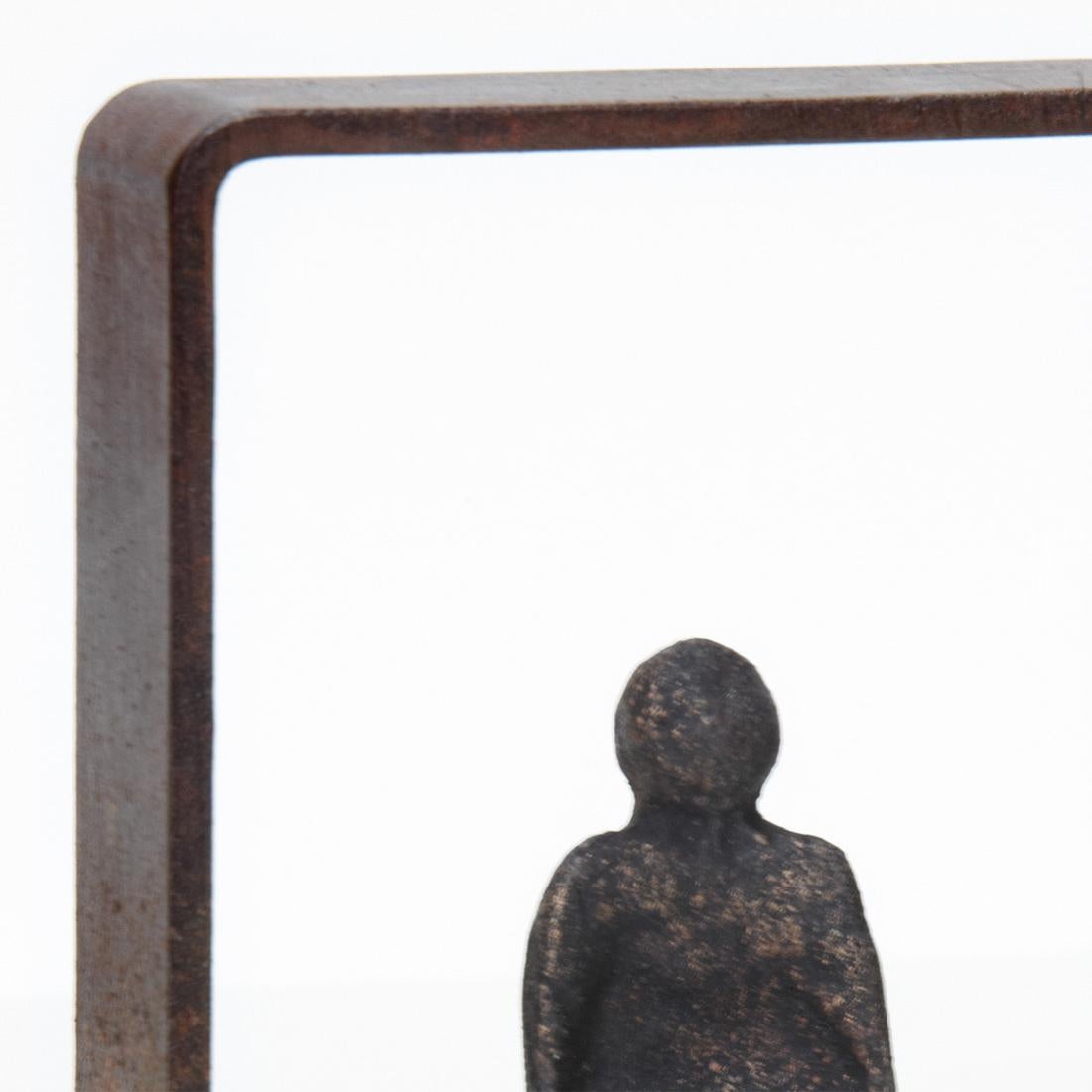 Sculpture threshold bronze with frame in
iron in oxydised finish and with body sculpture
in solid bronze in brown finish.