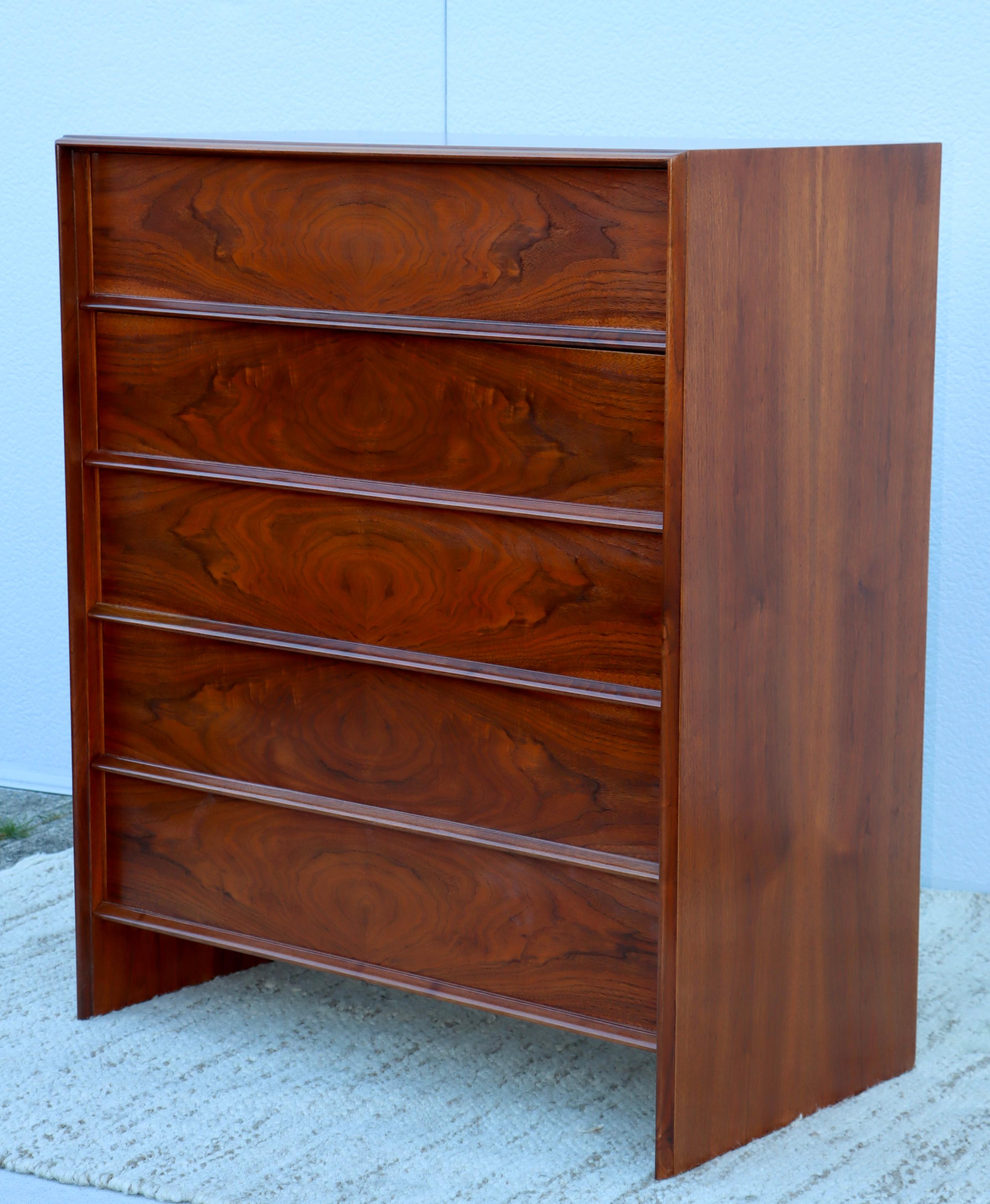 1960's Mid-Century Modern T.H. Robsjohn Gibbings for Widdicomb 5 drawer tall walnut dresser, fully restored with minor wear and patina due to age and use.