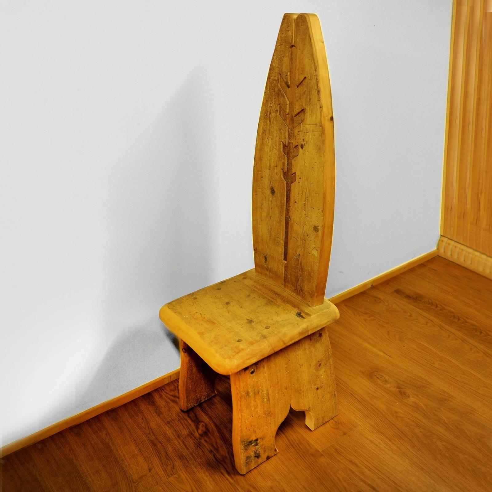 This unique chair in the shape of a superb throne was crafted of old wood used to cover the floor of 16th century-old homes. A mix of larch, pine, fir, and Swiss pine, this chair boasts one-of-a-kind signs of time that add a special texture to the