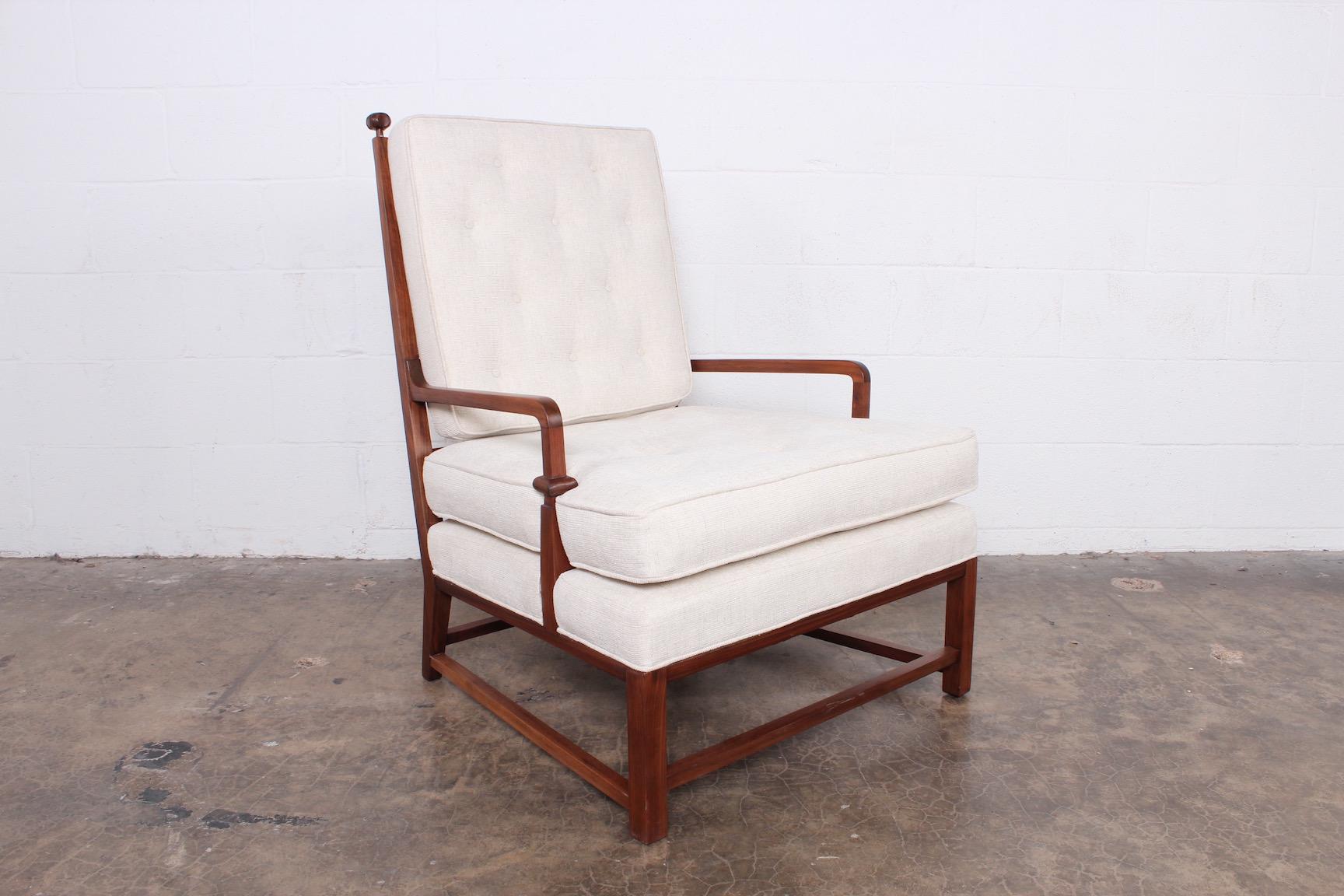 A rare mahogany throne chair designed by Tommi Parzinger for Parzinger originals.
    