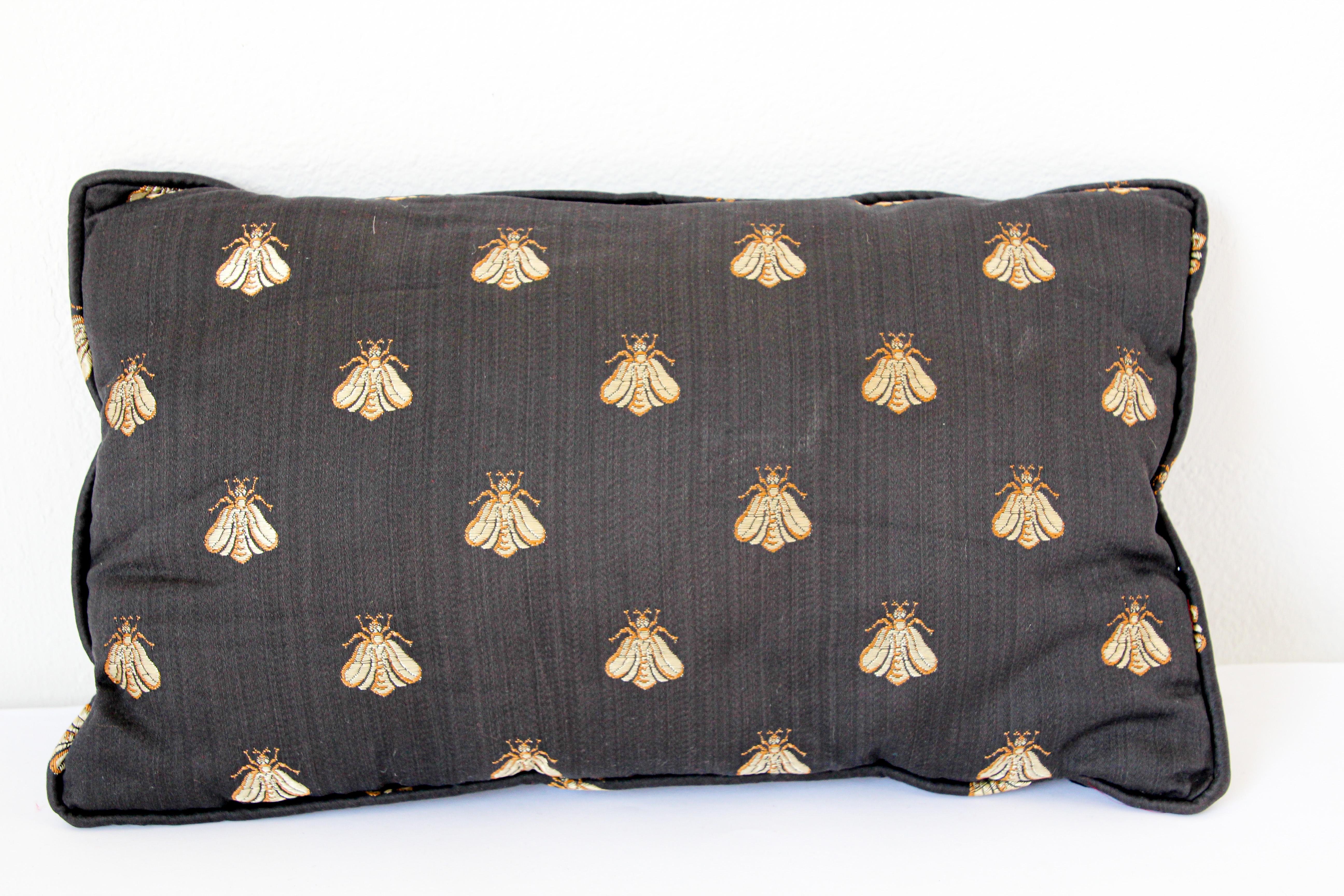 Throw decorative accent black raw silk pillow embellished with gold bees designs.
Decorative twisted trims all around.