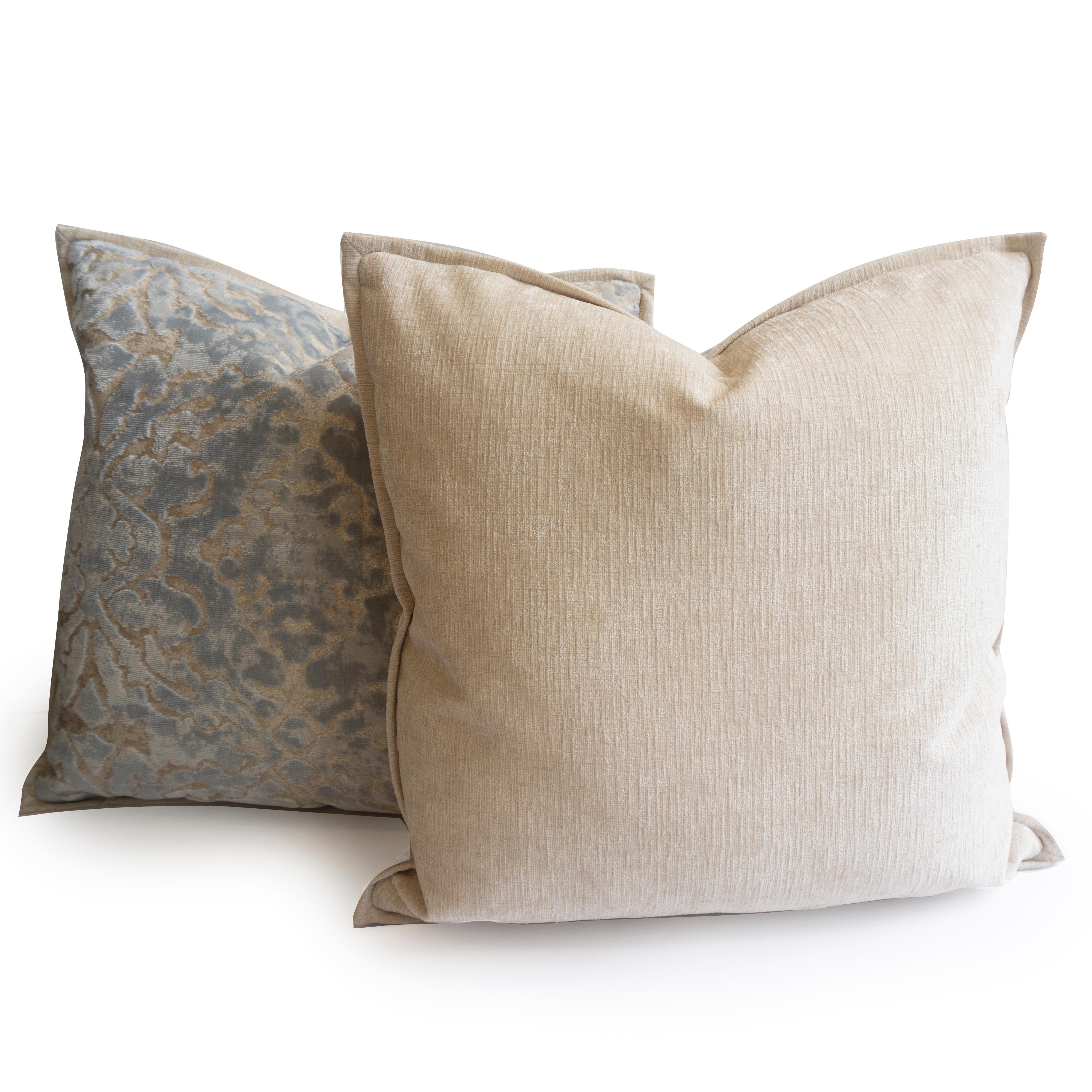 This pair of throw pillows were hand sewn at our studio in Norwalk, Connecticut. The pillows feature a light blue cut velvet damask pattern and beige back and flange. 
Made to Order.

Measurements: 20