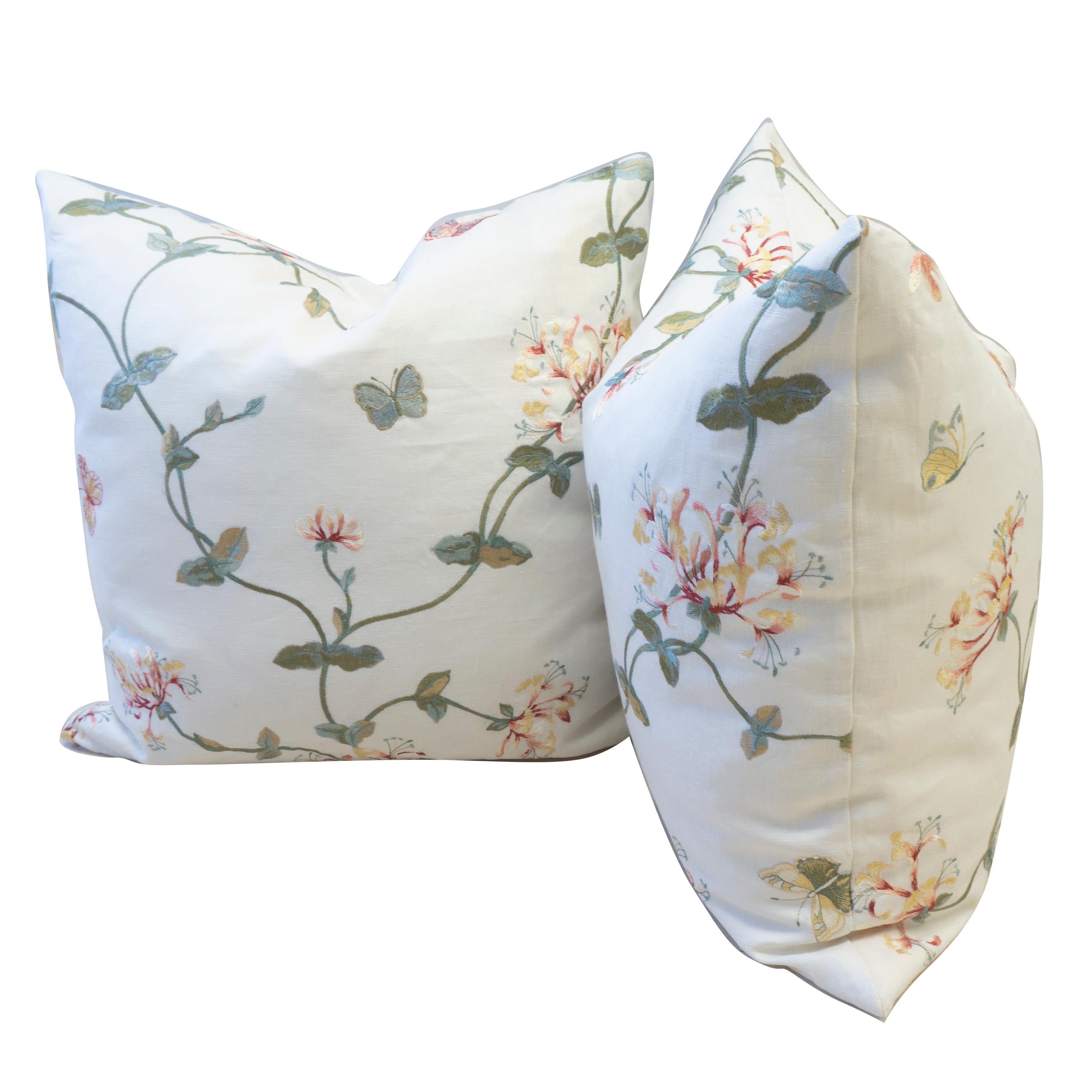 This pair of hand sewn throw pillows was made by us in our Norwalk, Connecticut studio. The pillows feature a delicate linen with embroidered flowers on a vine. 

Measurements: 20