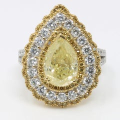 Thumbnail Two-Tone Gold Fancy Yellow Pear and White Diamond Halo Ring