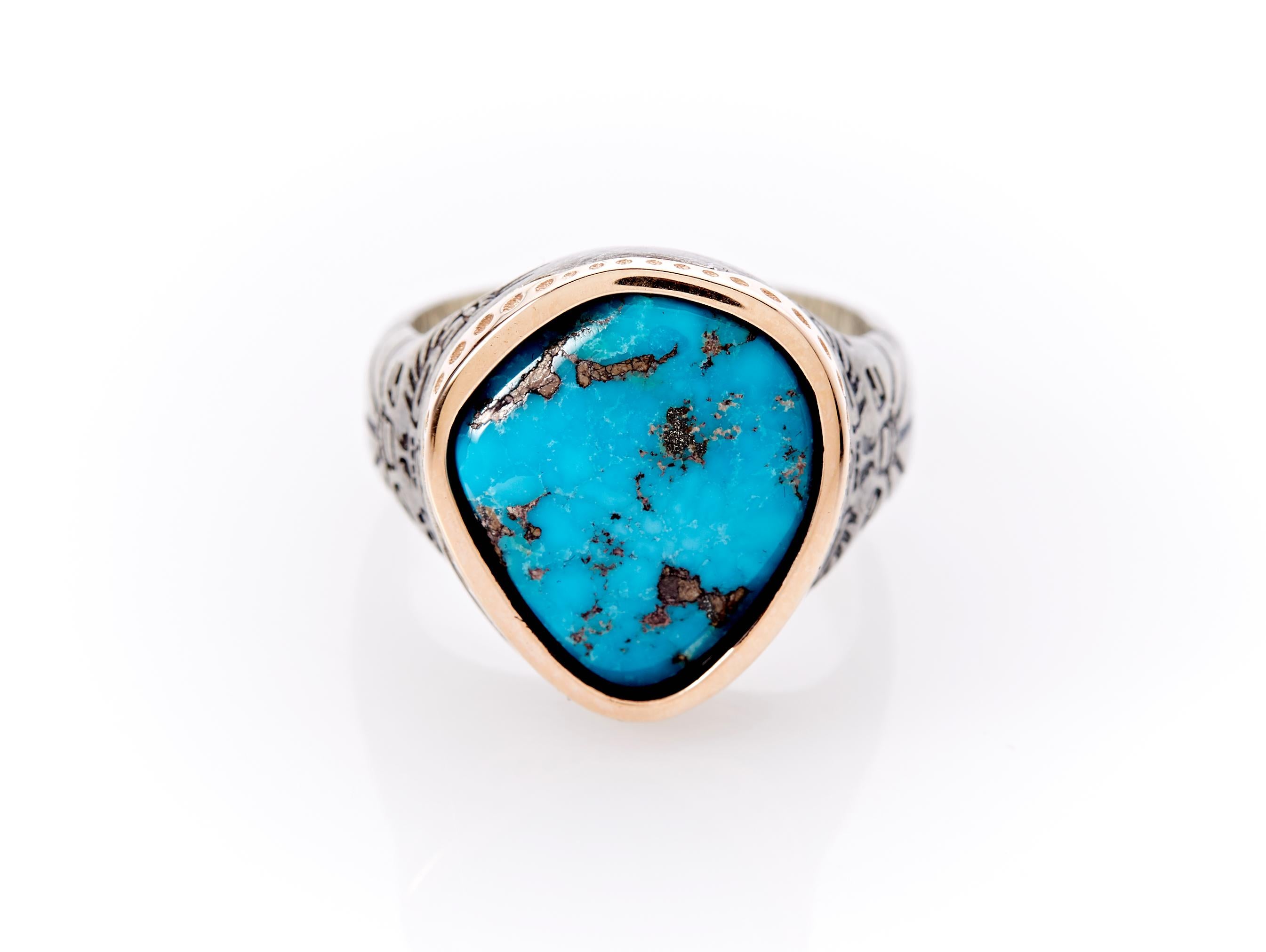 One of a kind Thunderbird 18ct Rose Gold and Oxidized Sterling Silver Morenci Turquoise Ring by Harlin Jones of New York. This unisex features exquisite craftsmanship but styling thats easy to wear everyday. 

Ring details:
-18ct rose gold
-Oxidized