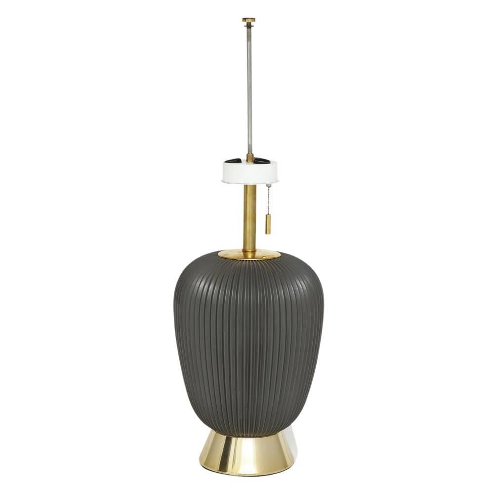 Thurston for Lightolier Gunmetal Porcelain Table Lamp USA 1950's. Fine fluted porcelain table lamp in gunmetal glaze by Gerald Thurston for Lightolier. Japanese lantern inspired form. This lamp has been rewired with a french silk cord for immediate