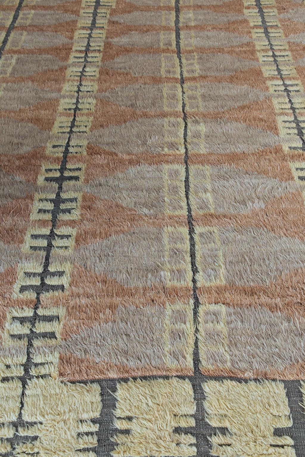 The 'Thus' rug is a handwoven wool piece inspired by vintage Scandinavian design elements and recreated for the modern design world. The repetitive grid creates balance and harmony, handwoven with a neutral flat weave and unique piles of blush,