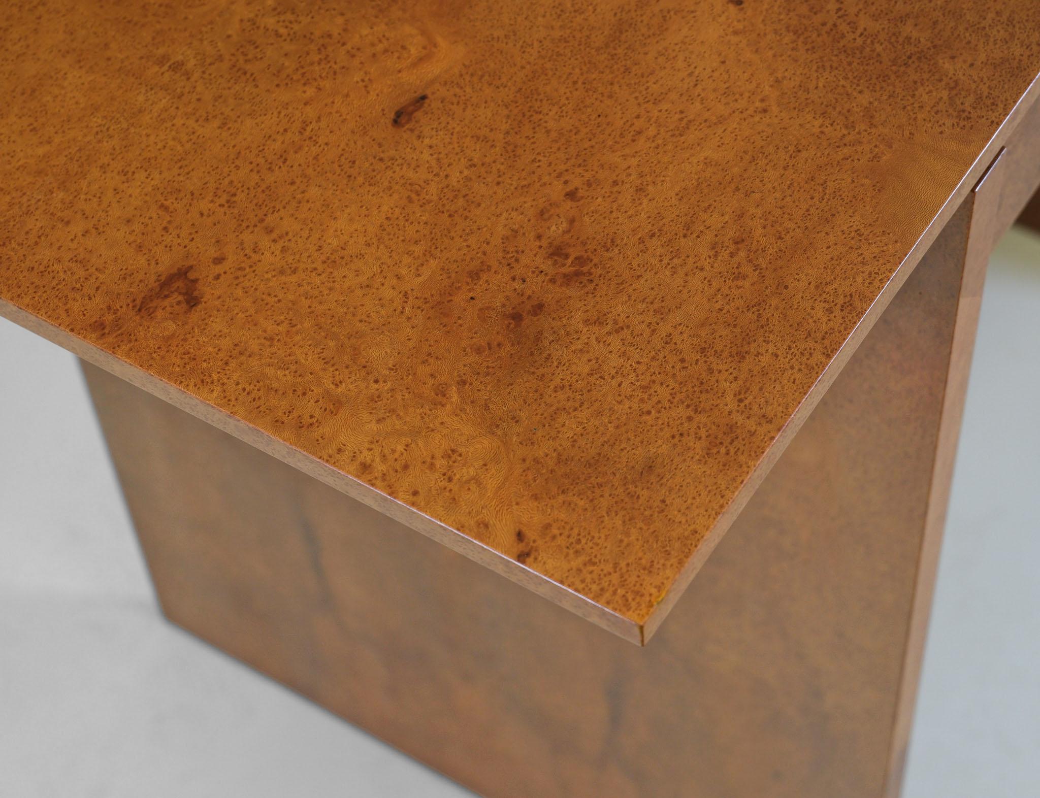 Minimalist design thuya burl wood two drawer console table & bevelled mirror. Made by John Coleman. The mirror signed and dated 1993.

The table could also work well as a desk.

Veneered in exotic thuya burl wood to a book match design, and showing