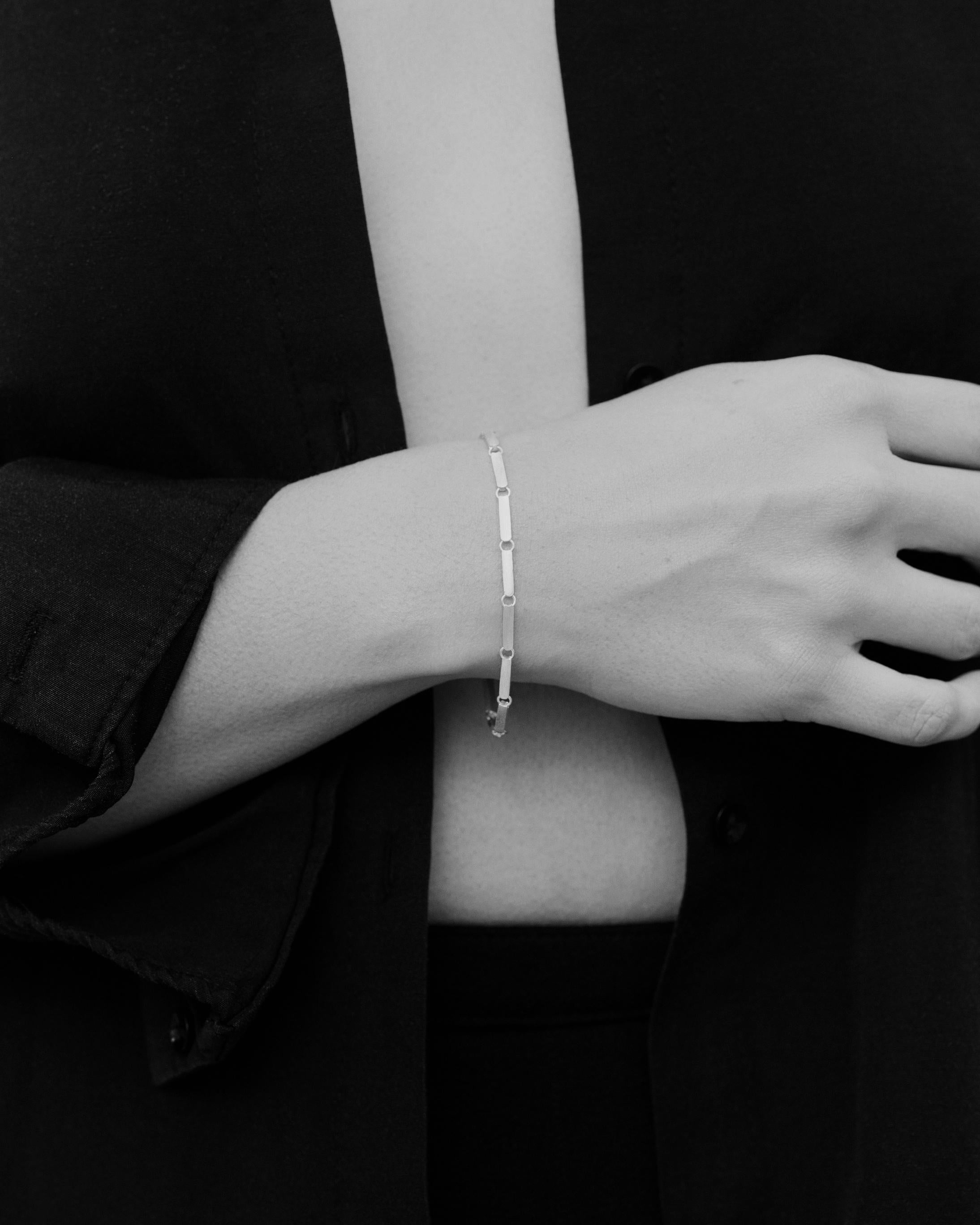 An uncomplicated and elegant classic chain named for Italian summers. Artisan-made in Los Angeles from recycled 14 karat white gold. 

The Estate Chain Bracelet wears delicately on the wrist. It is a beautiful forever piece of jewellery that is