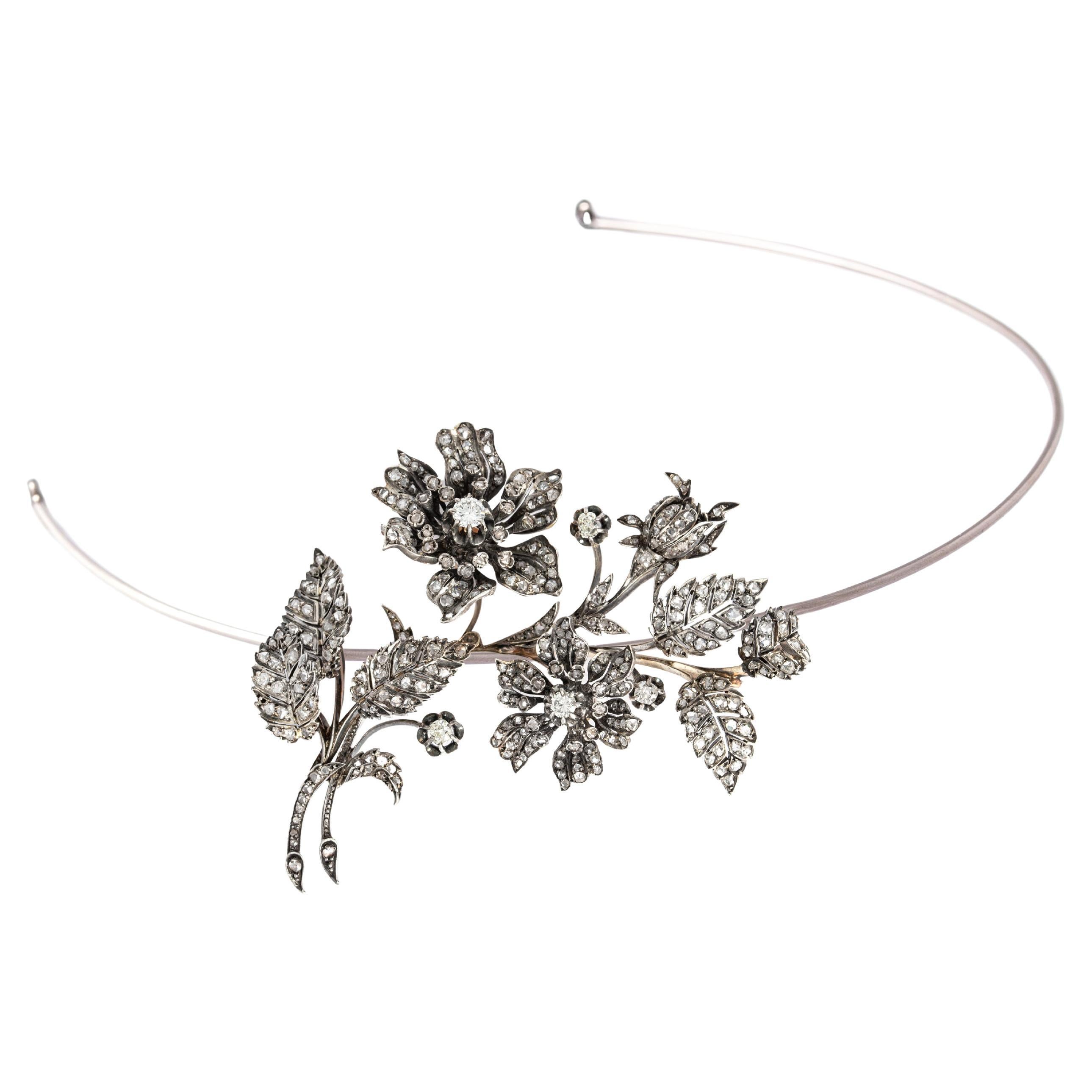 Antique Tiara convertible En Tremblant Flower Diamond Brooch on Silver and Gold.
French marks. 
Late 19th Century.

Tiara frame in titanium flexible and adaptable to all sizes.
Length: approximately 9.00 centimeters.
Width at maximum: approximately