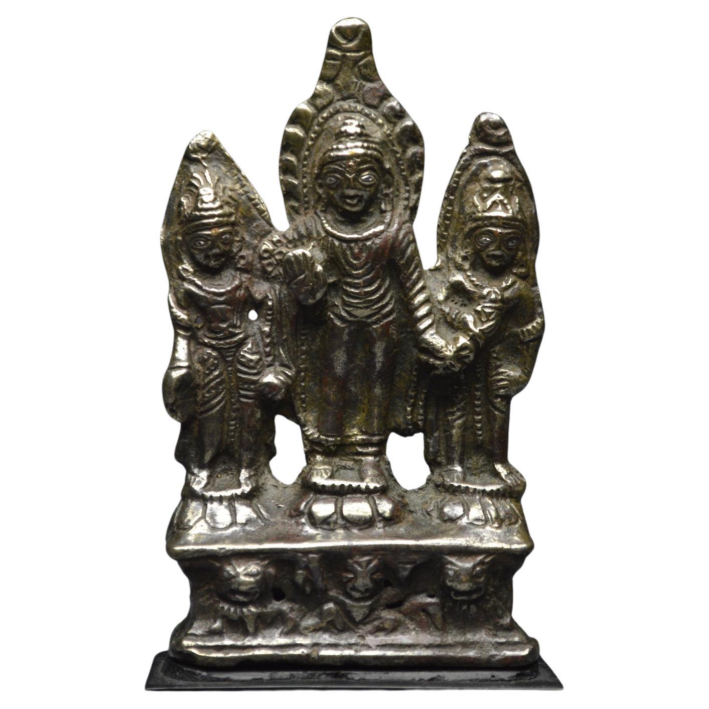 Tibet, 10th-12th Century, Buddha and Bodhisattvas, Copper alloy and silver inlay
