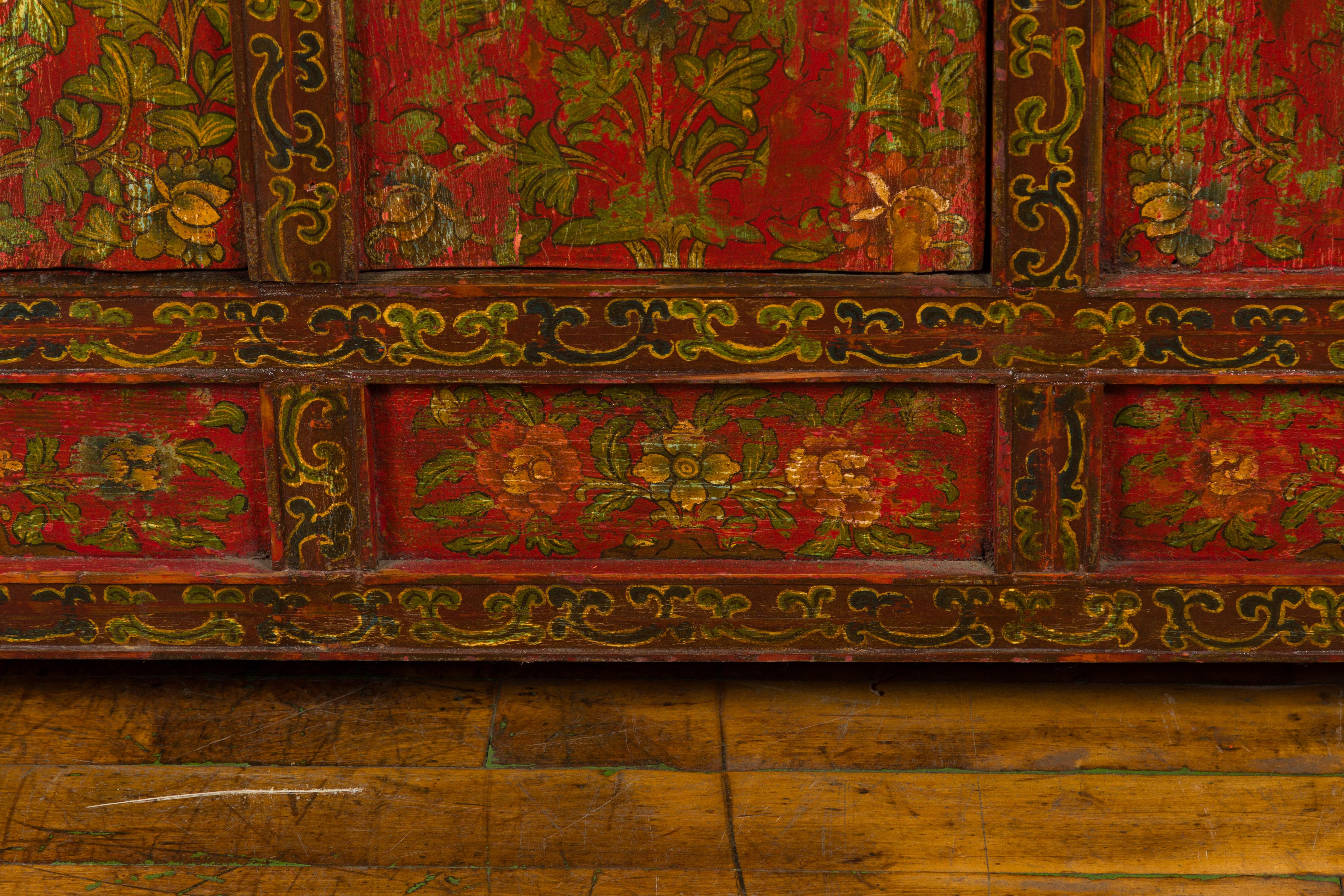 Tibetan 19th Century Cabinet with Hand-Painted Floral Décor on Red Ground For Sale 1